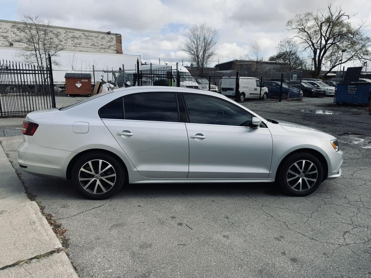2016 Volkswagen Jetta Sedan Auto 1.8TSport  CleanCarfax BackUpCamera 2Rim&Tire Photo