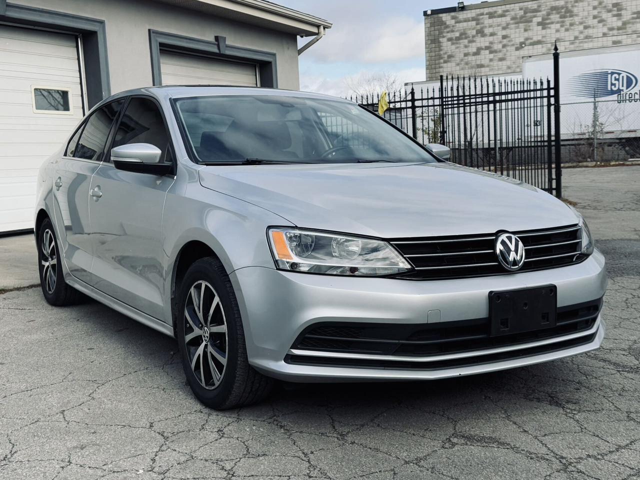2016 Volkswagen Jetta Sedan Auto 1.8TSport  CleanCarfax BackUpCamera 2Rim&Tire Photo