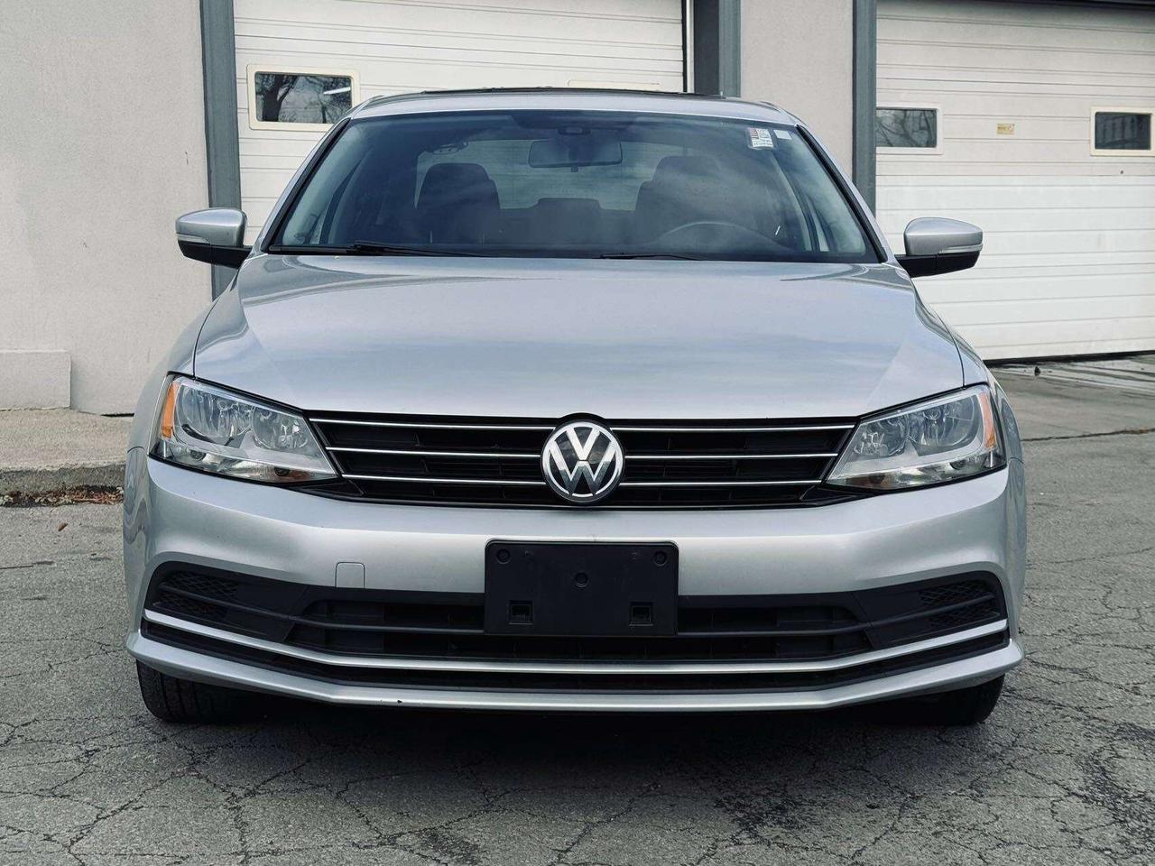 2016 Volkswagen Jetta Auto 1.8TSport  CleanCarfax BackUpCamera 2Rim&Tire Photo