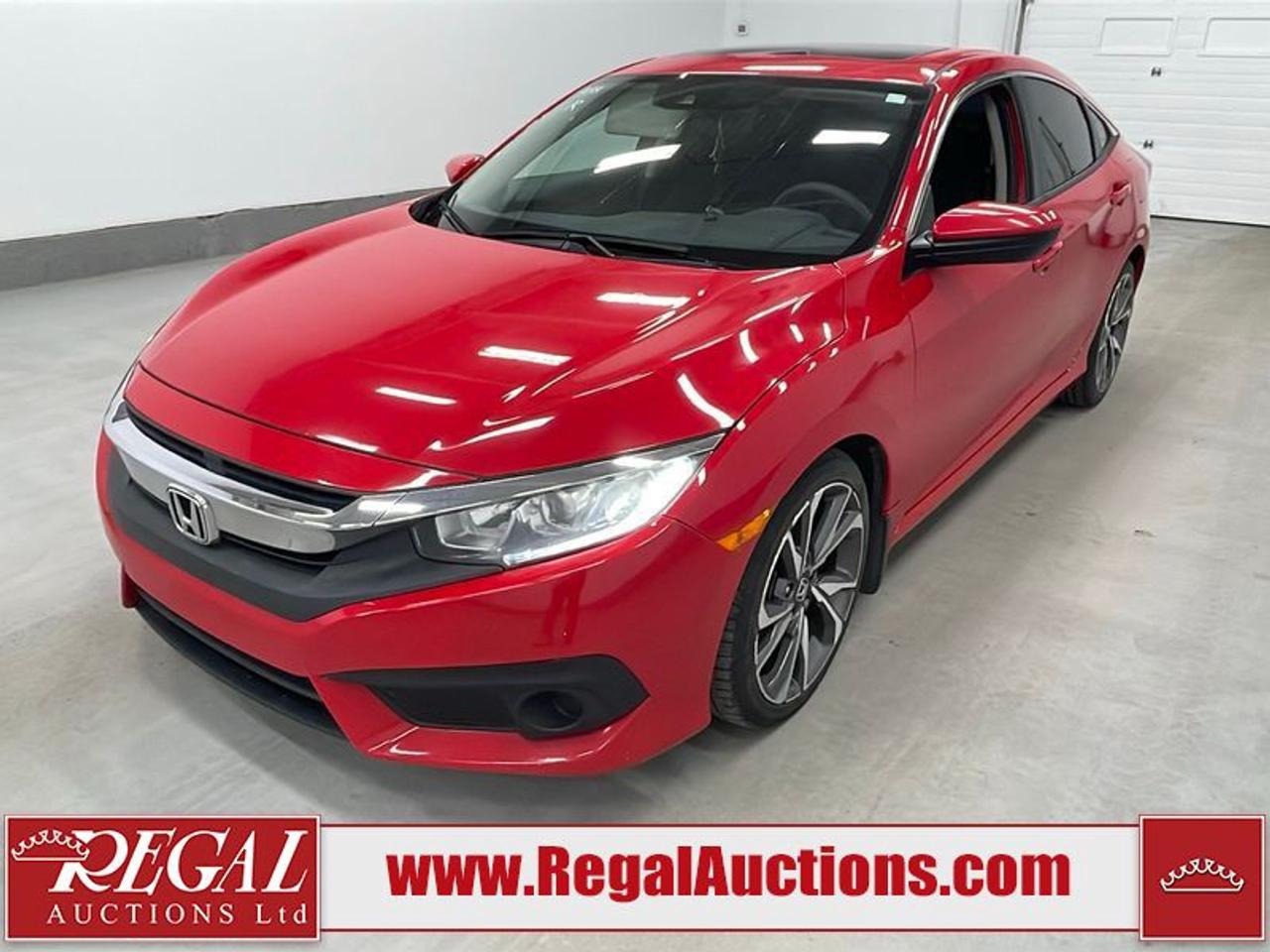 OFFERS WILL NOT BE ACCEPTED BY EMAIL OR PHONE - THIS VEHICLE WILL GO ON TIMED ONLINE AUCTION on Tuesday July 28.<br><br/>VEHICLE DESCRIPTION <br/>Stock #: 43014 <br/>Lot #: 309R <br/>Reserve Price: $7,500 <br/>CarProof Report: Available at www.RegalAuctions.com <br/><br/>IMPORTANT DECLARATION <br/>Claim History: Claim History. <br/>Finance Repo: This vehicle has been seized or surrendered to a creditor or bankruptcy trustee. <br/>Active Status: This vehicles title is listed as Active Status. <br/> Live Online Bidding: This vehicle will be available for bidding over the internet, visit www.RegalAuctions.com to register. <br/> <br/>The simple solution to selling your car or truck. Bring your clean vehicle in with your Drivers License and current Registration and well put it on the auction block at our next sale.<br/><br/>www.RegalAuctions.com