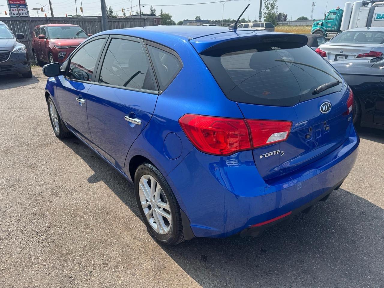 2012 Kia Forte5 EX, FUEL SAVER, AUTO, CERTIFIED Photo