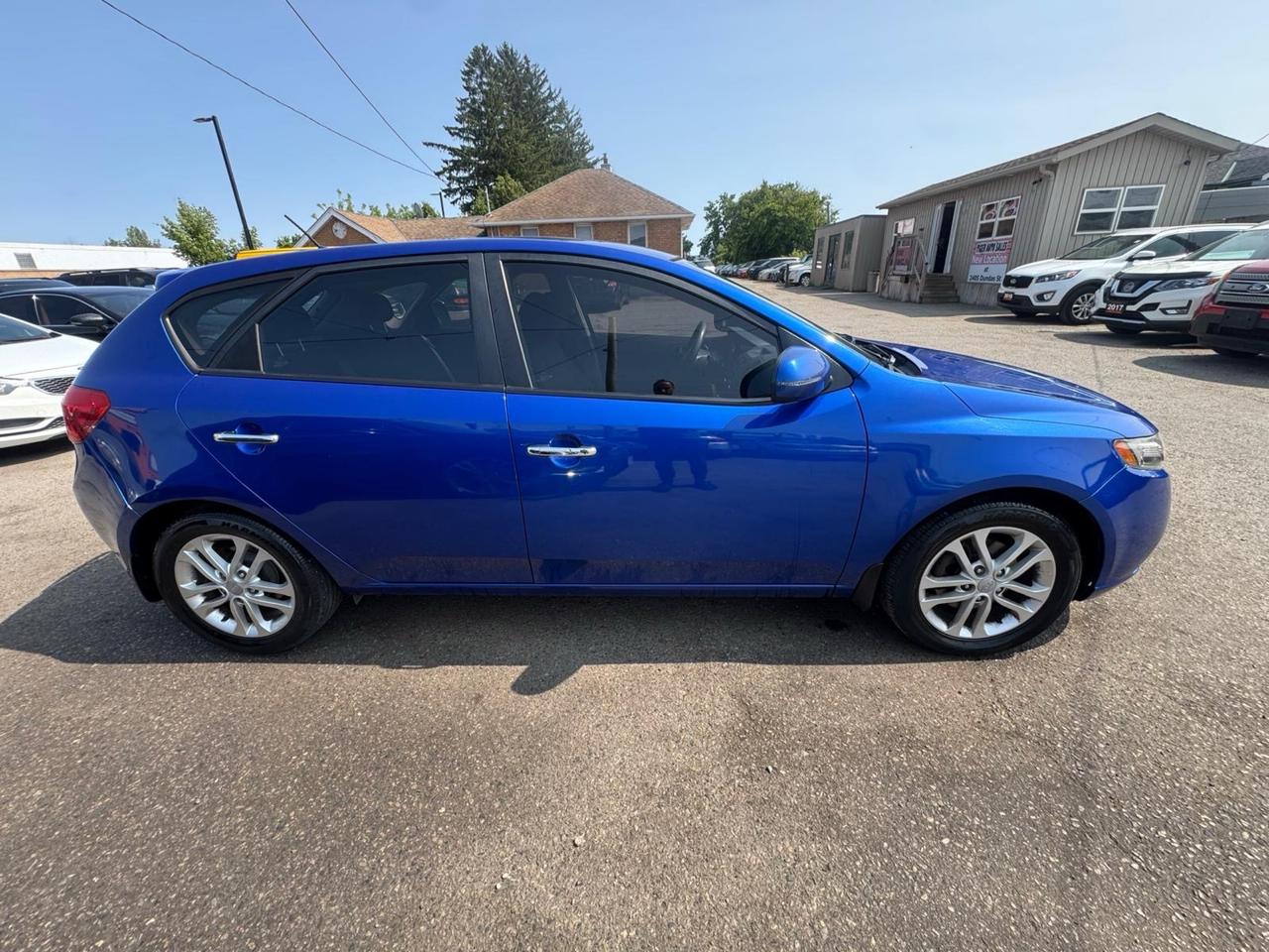 2012 Kia Forte5 EX, FUEL SAVER, AUTO, CERTIFIED Photo