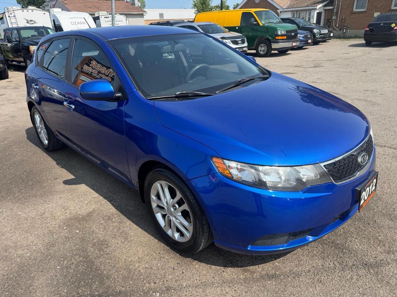 2012 Kia Forte5 EX, FUEL SAVER, AUTO, CERTIFIED Photo