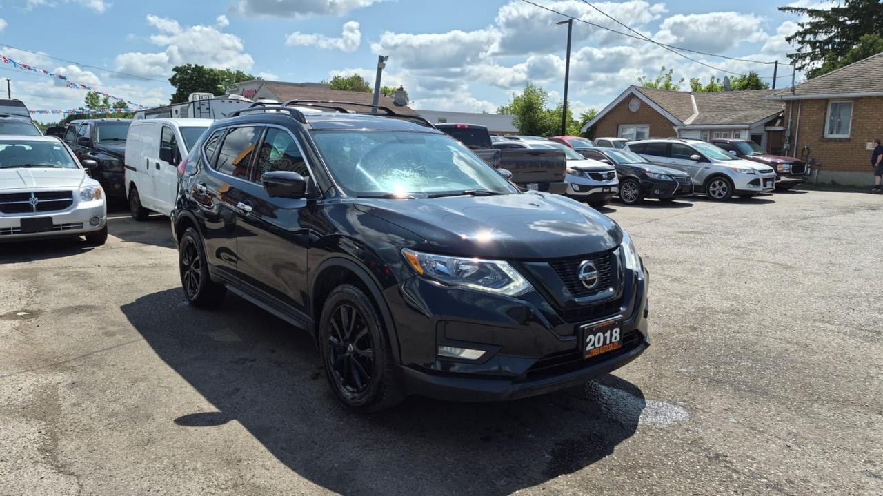 2018 Nissan Rogue SV AWD, BLACK ON BLACK,SUNROOF, CERTIFIED Photo