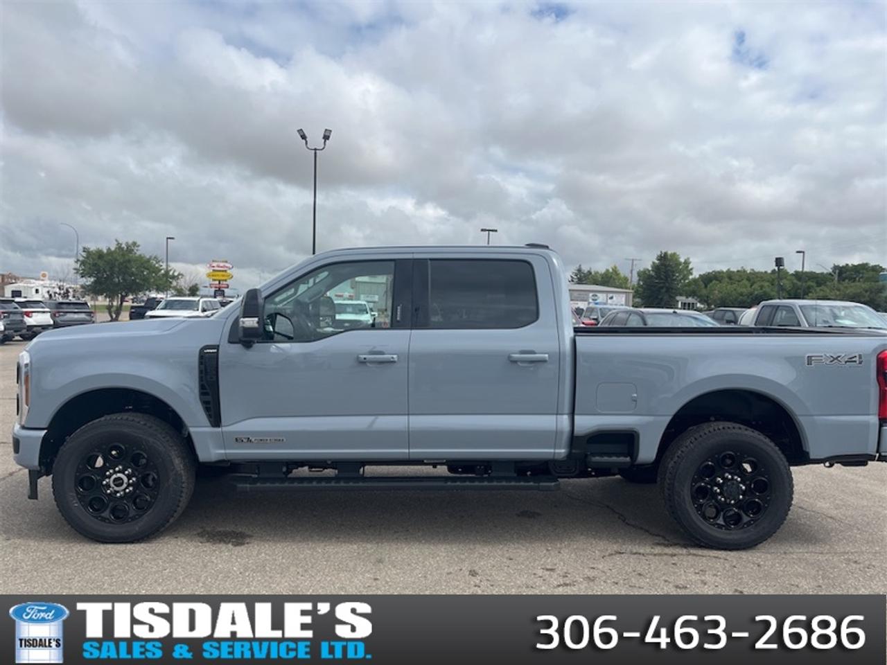 <b>FX4 Off-Road Package, Black Appearance Package, Spray-in Bedliner, Tailgate Step and Handle!</b><br> <br> Check out the large selection of new Fords at Tisdales today!<br> <br>This Ford F-350 boasts a quiet cabin, a compliant ride, and incredible capability.<br> <br>The most capable truck for work or play, this heavy-duty Ford F-350 never stops moving forward and gives you the power you need, the features you want, and the style you crave! With high-strength, military-grade aluminum construction, this F-350 Super Duty cuts the weight without sacrificing toughness. The interior design is first class, with simple to read text, easy to push buttons and plenty of outward visibility. This truck is strong, extremely comfortable and ready for anything.<br> <br>This Glacier Grey Metallic Tri-coat sought after diesel Crew Cab 4X4 pickup has an Automatic transmission and is powered by a 475HP 6.7L 8 Cylinder Engine. <br> <br> Our F-350 Super Dutys trim level is Lariat. Experience rugged capability and luxury in this F-350 Lariat trim, which features leather-trimmed heated and ventilated front seats with power adjustment, memory function and lumbar support, a heated leather-wrapped steering wheel, voice-activated dual-zone automatic climate control, power-adjustable pedals, a sonorous 8-speaker Bang & Olufsen audio system, and two 120-volt AC power outlets. This truck is also ready to get busy, with equipment such as class V towing equipment with a hitch, trailer wiring harness, a brake controller and trailer sway control, beefy suspension with heavy duty shock absorbers, power extendable trailer style mirrors, and LED headlights with front fog lamps and automatic high beams. Connectivity is handled by a 12-inch infotainment screen powered by SYNC 4, bundled with Apple CarPlay, Android Auto, inbuilt navigation, and SiriusXM satellite radio. Safety features also include a surround camera system, pre-collision assist with automatic emergency braking and cross-traffic alert, blind spot detection, rear parking sensors, forward collision mitigation, and a cargo bed camera. This vehicle has been upgraded with the following features: FX4 Off-Road Package, Black Appearance Package, Spray-in Bedliner, Tailgate Step and Handle.<br><br> View the original window sticker for this vehicle with this url <b><a href=http://www.windowsticker.forddirect.com/windowsticker.pdf?vin=1FT8W3BT0TEF43253 target=_blank>http://www.windowsticker.forddirect.com/windowsticker.pdf?vin=1FT8W3BT0TEF43253</a></b>.<br> <br>To apply right now for financing use this link: <a href=http://www.tisdales.com/shopping-tools/apply-for-credit.html target=_blank>http://www.tisdales.com/shopping-tools/apply-for-credit.html</a><br> <br/>5.49% financing for 84 months. <br> Buy this vehicle now for the lowest bi-weekly payment of <b>$801.02</b> with $0 down for 84 months @ 5.49% APR O.A.C. ( Plus applicable taxes - $699 administration fee included in sale price. ). Incentives expire 2026-08-31. See dealer for details. <br><br>Tisdales is not your standard dealership. Sales consultants are available to discuss what vehicle would best suit the customer and their lifestyle, and if a certain vehicle isnt readily available on the lot, one will be brought in.<br> Come by and check out our fleet of 20+ used cars and trucks and 80+ new cars and trucks for sale in Kindersley.  o~o