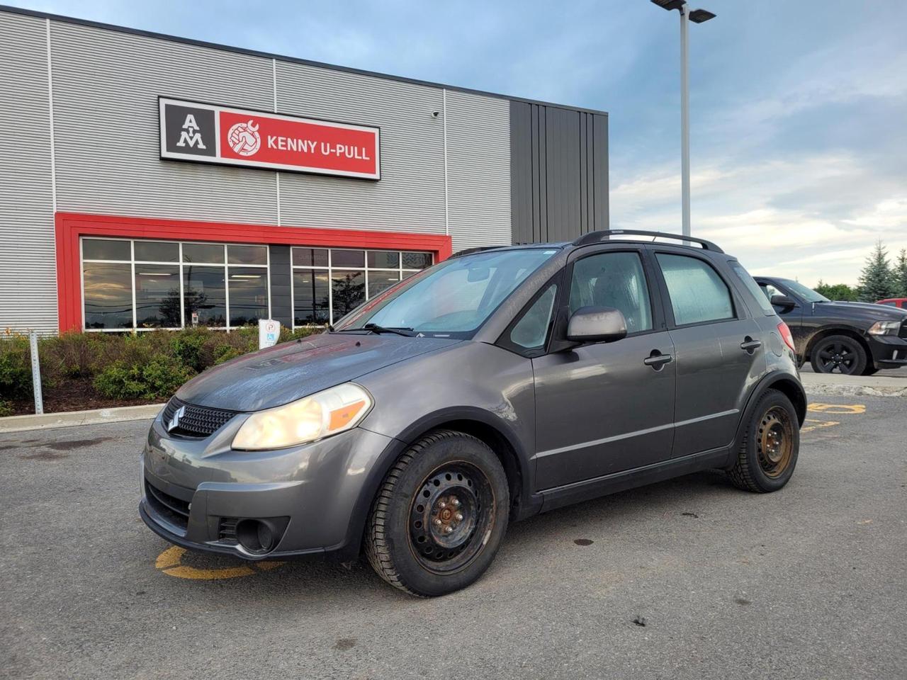 2010 Suzuki SX4 in Grey. The vehicle has 172,807km. The vehicle runs and drives. Check engine light is on. Few imperfections/rust around the car. We dont perform any mechanical/safety inspections. The vehicle is sold as is and might need some work.