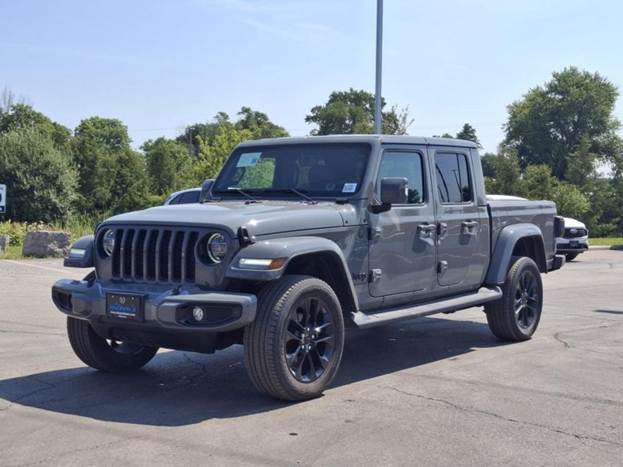 Come see this certified 2022 Jeep Gladiator High Altitude 4x4 | Leather | Tow Package | Heated Seats + Steering | Blind Spot Monitor | and More!. Its Automatic transmission and 3.6 L engine will keep you going. This Jeep Gladiator comes equipped with these options: Tow Package, Parking Sensors, Leather, Heated Steering Wheel, Air Conditioning, Heated Seats, Tilt Steering Wheel, Steering Radio Controls, Power Windows, and Power Locks. Test drive this vehicle at Mark Wilsons Better Used Cars, 5055 Whitelaw Road, Guelph, ON N1H 6J4.MASSIVE SELECTION: 500+ vehicles in ONE LOCATION, all Live Market Priced for the best value!STRAIGHTFORWARD & TRANSPARENT PRICING: Our Advertised Price INCLUDES:Safety Certification! (No separate certification fee upcharge).FREE Carfax History Report!NO upcharge for paying cash!CONFIDENCE & PEACE OF MIND: 30-Day/3,000 km Warranty INCLUDED! Plus a 5-Day Exchange Privilege!*EASY FINANCING: Better-than-bank rates, $0 Down, and 3 Months No Payments available OAC. BAD CREDIT APPROVED HERE!WE BUY CARS: Get Top Dollar for your trade, or sell us your vehicle for CASH even if you dont buy ours!www.shopwilsons.comAn Honest, Transparent Buying Experience. Trusted in business since 1961!(Cash Prices Exclude HST and Licensing Fees only.)