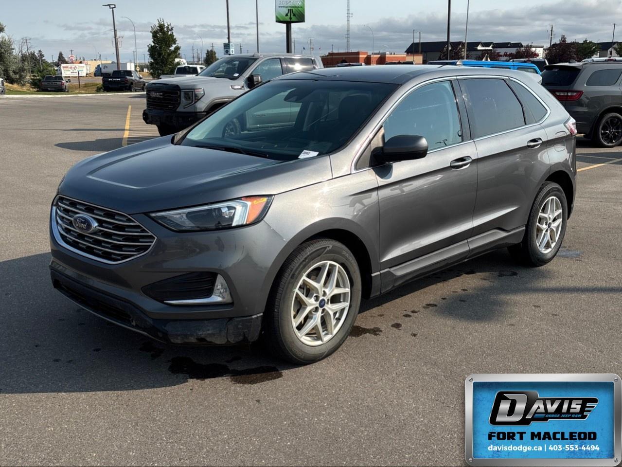 <p>Experience the 2022 Ford Edge SEL AWD in a refined gray finish, offering robust all-wheel-drive capabilities and a seamless automatic transmission for exceptional handling.</p><p><strong>Interior Features:</strong></p><ul><li>Spacious and luxurious cabin with comfortable heated seats</li><li>Convenient keyless entry and power seats for personalized comfort</li><li>Advanced air conditioning and power windows for a pleasant driving environment</li><li>Smart device integration and a satellite radio to keep you entertained on every journey</li></ul><p><strong>Exterior Features:</strong></p><ul><li>Sleek alloy wheels for a stylish and sturdy exterior</li><li>Well-equipped with a versatile body typified by the parking sensors</li></ul><p><strong>Technology & Safety Features:</strong></p><ul><li>Cutting-edge lane assist and brake assist for enhanced driving security</li><li>Protection ensured by an intuitive backup camera</li><li>Remote start and a Wi-Fi hotspot for modern convenience and connectivity</li><li>Bluetooth connection for safe and hands-free communication</li></ul><p>This Ford Edge is ideal for those seeking a balance of performance, technology, and comfort. Whether for family adventures or daily commutes, it covers all bases. Contact Davis Dodge Fort Macleod today to learn more about this dynamic SUV and schedule your test drive.</p>