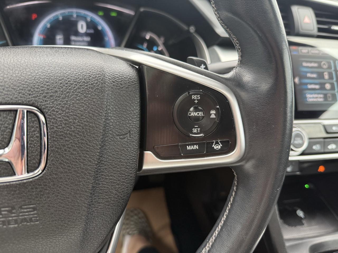 2016 Honda Civic COUPE Touring Photo