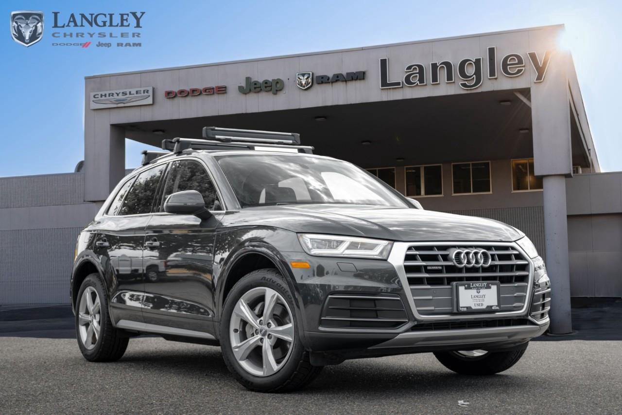 <h2><strong>2018 Audi Q5 Progressiv 2.0 TFSI quattro Progressiv S tronic</strong></h2><p>A versatile and luxurious compact luxury SUV equipped with advanced quattro all-wheel drive capability.</p><ul><li><p><strong>Engine</strong>: 2.0L Turbo 4-cylinder (252 hp, 273 lb-ft torque)</p></li><li><p><strong>Transmission</strong>: 7-speed S tronic dual-clutch automatic</p></li><li><p><strong>Drivetrain</strong>: quattro all-wheel drive</p></li><li><p><strong>Fuel Economy</strong>: 22 city / 27 highway MPG</p></li><li><p><strong>Max Towing</strong>: Up to 4,400 lbs</p></li></ul><p>Come book a test drive at Langley Chrysler, conveniently located in Langley, British Columbia.</p>

<p>*All prices plus applicable taxes, applicable environmental recovery charges, documentation of $599 and full tank of fuel surcharge of $76 if a full tank is chosen. <br />Other protection items available that are not included in the above price:<br />Tire & Rim Protection and Key fob insurance starting from $599<br />Service contracts (extended warranties) for coverage up to 7 years and 200,000 kms starting from $599<br />Custom vehicle accessory packages, mudflaps and deflectors, tire and rim packages, lift kits, exhaust kits and tonneau covers, canopies and much more that can be added to your payment at time of purchase<br />Undercoating, rust modules, and full protection packages starting from $199<br />Financing Fee of $500 when applicable<br />Flexible life, disability and critical illness insurances to protect portions of or the entire length of vehicle loan</p>