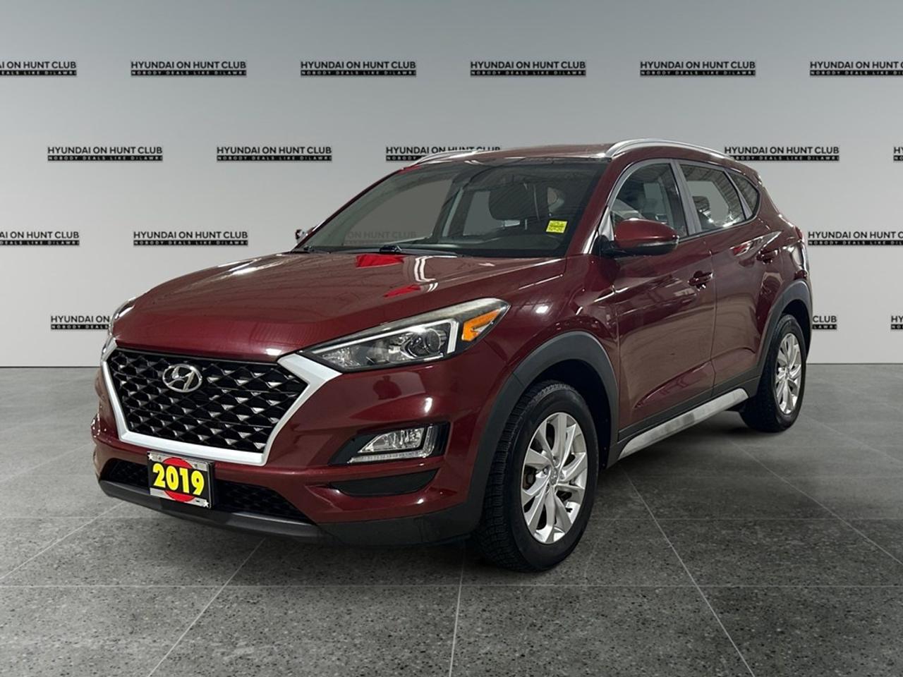 Certified Pre-Owned. Introducing the 2019 Hyundai Tucson Preferred AWD in a striking red exterior. This SUV combines the robust capability of all-wheel drive with the convenience of an automatic transmission, ensuring smooth handling and performance in every journey. The Tucsons stylish exterior is complemented by modern alloy wheels and heated mirrors, adding functionality to its dynamic design. Step inside to experience comfort and style with heated front and rear seats, a heated leather steering wheel, and a leather gear shifter that elevate every drive. Keyless entry and smart device integration ensure that you have all the modern conveniences at your fingertips. Stay connected and safe on the road with advanced technology features such as a backup camera and lane assist. Enjoy your favorite tunes through a Bluetooth connection and easily manage your journey with cruise control. With the added efficiency of brake assist and the comfort of air conditioning, your drives will be both safe and enjoyable. This Hyundai Tucson is perfect for families and adventure seekers who value comfort, safety, and technology in their everyday vehicle. Dont hesitate to contact Hyundai On Hunt Club for more information or to schedule a test drive today! **ADVERTISED PRICE IS FOR FINANCE DEALS ONLY, CASH PRICE MAY BE SUBJECT TO INCREASE. SEE DEALER FOR DETAILS*** $16,488 Cash * $16,488 Finance