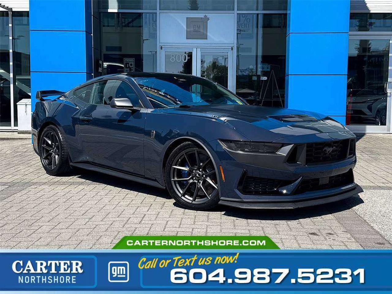 NO ACCIDENT | ONE LOCAL OWNER
Unleash incredible performance in this Powerful Pre-Owned 2024 Ford Mustang Dark Horse. Built with a naturally aspirated 5.0L V8 engine, race-inspired styling, advanced technology, and a driver-focused cockpit, this Mustang delivers an unforgettable driving experience. From its aggressive handling to its premium interior and modern safety features, every drive is designed to excite. Test Drive Today!

WHY CARTER GM NORTHSHORE?

- An unrivalled vehicle purchasing experience!
- Exceeding our loyal customers expectations since 1990
- 4.7 Google star rating (with 1,700+ customer reviews)
- CarGurus Top-Rated Dealer 2025 Award
- CarGurus Top Value Dealer 2025 Award
- Peace of mind - 150-point vehicle inspection
- CARFAX - full vehicle service history - purchase with confidence!
- Vehicle trades welcome! Best price guaranteed!
- We provide upfront pricing, zero hidden fees, and 100% transparency
- Fast approvals and 99% acceptance rates (no matter your current credit status!)
- Multilingual staff (many languages spoken)
- Comfortable non-pressured environment with in-store television, WIFI and a childrens play area!





Were here to help you drive the vehicle you want, the vehicle you deserve!
QUESTIONS? GREAT! WEVE GOT ANSWERS!
To speak with a friendly vehicle specialist - CALL NOW!
The advertised price includes all standard dealer fees and any applicable manufacturer or dealer incentives. It does not include applicable taxes, licensing, insurance, or optional products or services. Dealer fees will be clearly broken out and itemized on the bill of sale, maximum total of fees $699.00. Prices are shown in Canadian dollars. While we make every effort to ensure accuracy, vehicle details, pricing, options, and availability are subject to change without notice. Please confirm all information with dealership sales management before purchase. Dealer Code: 81121