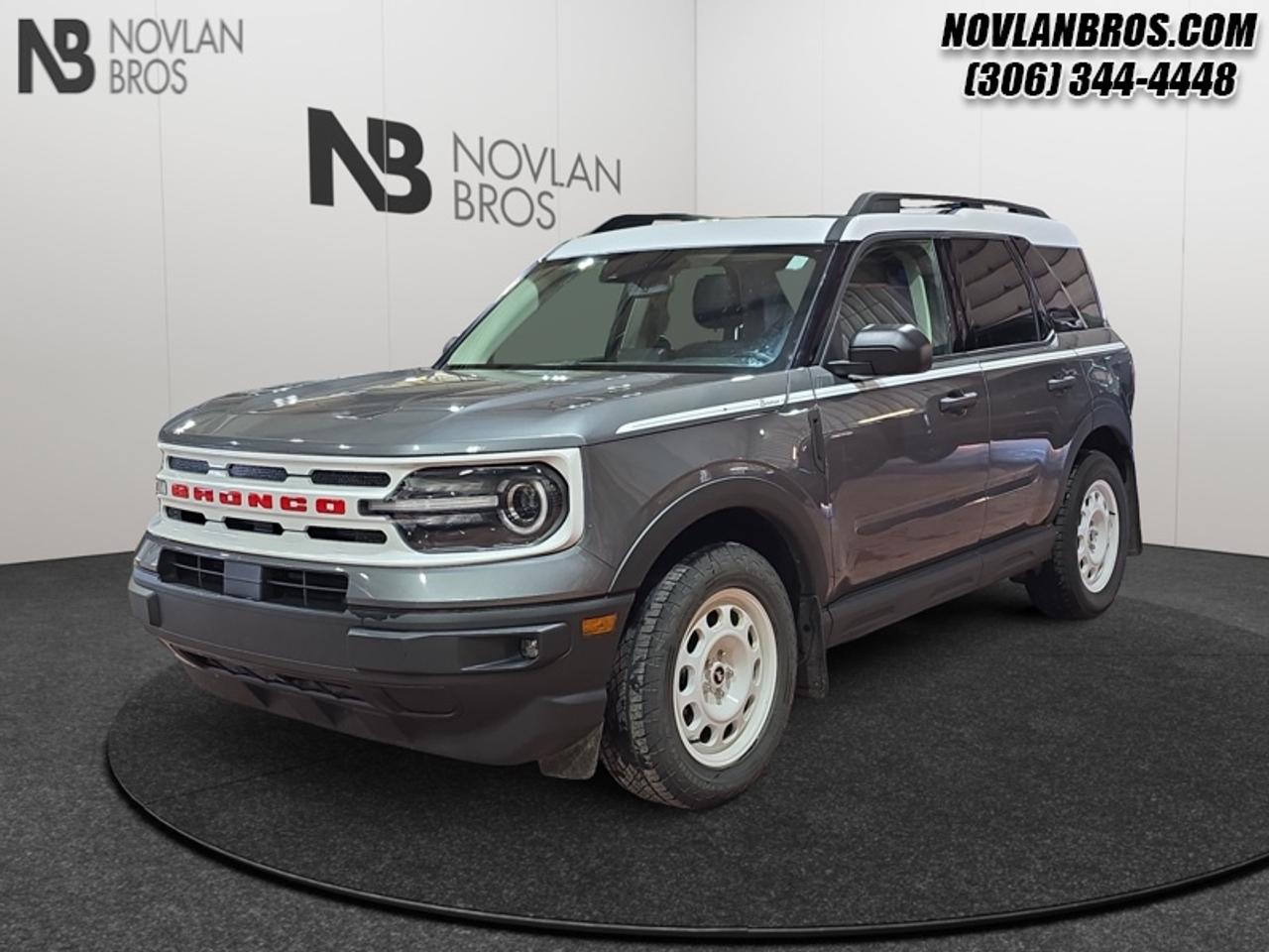 <b>Heated Seats, Sunroof, Alloy Wheels, Remote Engine Start, Rear View Camera!</b><br> <br> Check out our great inventory of pre-owned vehicles at Novlan Brothers!<br> <br>Designed for every adventurer, this Bronco Sport gets you out into the wild, and back again. This 2024 Ford Bronco Sport is fresh on our lot in Paradise Hill.<br> <br>A compact footprint, an iconic name, and modern luxury come together to make this Bronco Sport an instant classic. Whether your next adventure takes you deep into the rugged wilds, or into the rough and rumble city, this Bronco Sport is exactly what you need. With enough cargo space for all of your gear, the capability to get you anywhere, and a manageable footprint, theres nothing quite like this Ford Bronco Sport.<br> <br>This SUV has 58,559 km. Its Grey in colour and is completely accident free based on the <a href=https://vhr.carfax.ca/?id=NksvQiE2IBP2OHQyHZGhfS/A09vtddOd target=_blank>CARFAX Report</a>. It has a 8 Speed Automatic transmission and is powered by a 181HP 1.5L 3 Cylinder Engine. <br> <br> Our Bronco Sports trim level is Heritage. This Bronco Sport Heritage comes standard with unique aluminum wheels, class II towing equipment with a hitch and trailer sway control, heated cloth front seats that feature power lumbar adjustment, and SiriusXM streaming radio. Also standard include voice-activated automatic air conditioning, 8-inch SYNC 3 powered infotainment screen with Apple CarPlay and Android Auto, smart charging USB type-A and type-C ports, 4G LTE mobile hotspot internet access, proximity keyless entry with remote start, and a robust terrain management system that features the trademark Go Over All Terrain (G.O.A.T.) driving modes. Additional features include blind spot detection, rear cross traffic alert and pre-collision assist with automatic emergency braking, lane keeping assist, lane departure warning, forward collision alert, driver monitoring alert, a rear-view camera, and so much more. This vehicle has been upgraded with the following features: Heated Seats, Sunroof, Alloy Wheels, Remote Engine Start, Rear View Camera, Reverse Sense System, Bucket Seats.<br> To view the original window sticker for this vehicle view this <a href=http://www.windowsticker.forddirect.com/windowsticker.pdf?vin=3FMCR9G62RRE77278 target=_blank>http://www.windowsticker.forddirect.com/windowsticker.pdf?vin=3FMCR9G62RRE77278</a>. <br/><br> <br>To apply right now for financing use this link: <a href=http://novlanbros.com/credit/ target=_blank>http://novlanbros.com/credit/</a><br> <br/><br>The Novlan family is owned and operated by a third generation and committed to the values inherent from our humble beginnings.<br> Come by and check out our fleet of 20+ used cars and trucks and 100+ new cars and trucks for sale in Paradise Hill.  o~o