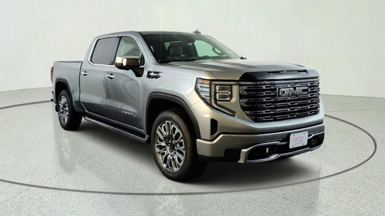 The 2026 GMC Sierra 1500 Denali Ultimate represents the pinnacle of GMC luxury and capability, combining a premium interior with authentic open-pore wood, full-grain leather seating, and advanced technology throughout the cabin. It delivers impressive performance with its 3.0L Duremax Diesel engine, sophisticated towing features, and Super Cruise hands-free driver assistance technology for enhanced confidence on the road. Distinctive Vader Chrome accents, exclusive Denali Ultimate badging, and a premium MultiPro Tailgate complete this upscale full-size pickups refined and commanding presence.