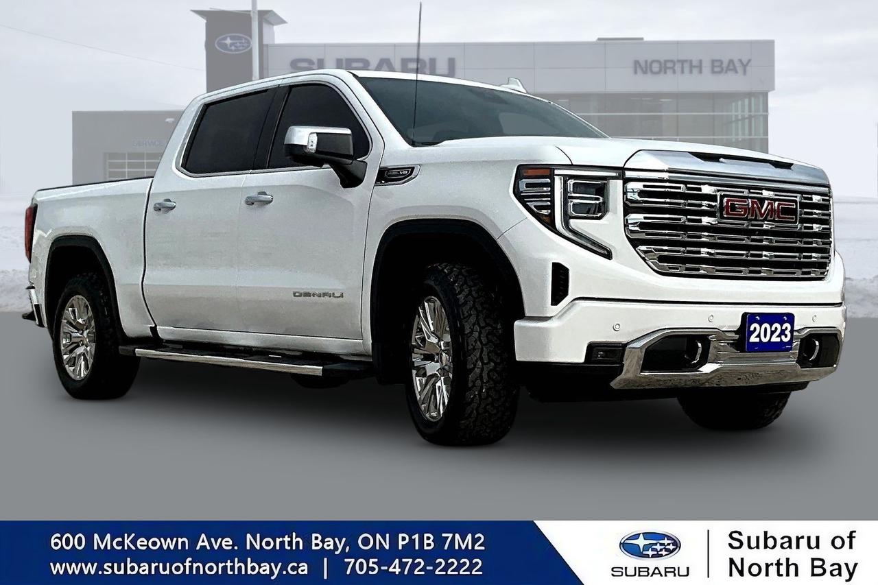 2023 GMC Sierra 1500 Denali Crew Cab 4WD, 5.3L V8, sunroof, heated steering wheel, navigation, adaptive cruise control, all-terrain tires, wireless charging  a one-owner, Clean CARFAX truck ready to work or tow around North Bay.
			
			This Sierra 1500 Denali arrives in Ceramic White with the Denali Premium Suspension and 20-inch polished aluminum wheels riding on P275/60R-20 all-terrain tires, giving it a commanding stance whether youre hauling through Sturgeon Falls or cruising Highway 11 toward Sudbury. Under the hood, the 5.3L EcoTec3 V8 pairs with a 10-speed automatic transmission and the AutoTrac two-speed transfer case, so 4WD confidence is always on tap when weather or terrain gets tricky  a real advantage for anyone cross-shopping against a Ford F-150 or Ram 1500 that may not offer this same blend of Denali-level refinement and true off-pavement capability.
			
			Inside, the GMC Premium Infotainment Systems 13.4-inch color touchscreen brings Google built-in compatibility and navigation capability right to your fingertips, while a 12-inch driver information center and available head-up display keep key info in view without distraction. The heated steering wheel adds welcome comfort on cold mornings, and wireless charging plus wireless hotspot capability mean phones stay powered and connected whether youre running errands in Callander or heading out toward Mattawa. The technology package also brings adaptive cruise control, lane-keep assist, and a back-up camera to the table  features that make longer hauls and tighter parking situations noticeably less stressful.
			
			Practicality hasnt been overlooked either. The rear seat with storage package adds usable cabin space for gear, tools, or family cargo, and the spray-on bedliner protects the box from the wear and tear that comes with real truck duty. Fog lamps improve visibility in low light, and the tire-pressure monitoring system helps keep this Sierra 1500 Denali running safely mile after mile. With 80,413 km on the odometer, this truck has plenty of life left, and its clean, non-smoker history means its been well cared for from day one.
			
			This particular Denali trim sets itself apart from a base Silverado or standard-trim competitor by combining upscale trim-level touches with genuine capability  youre not choosing between comfort and toughness here, youre getting both in one package. For someone who tows, hauls, or simply wants a truck that feels finished inside and out, this is a compelling alternative to shopping a Ford F-150 Lariat or Ram 1500 Laramie.
			
			Subaru of North Bay makes it easy to see this 2023 GMC Sierra 1500 Denali in person, with straightforward answers and a no-pressure look at the vehicles full history. Drivers from Powassan, Sturgeon Falls, Callander, and Mattawa regularly make the trip to North Bay for inventory like this  stop by or reach out today to schedule your test drive before this well-equipped Sierra 1500 Denali finds its next owner.