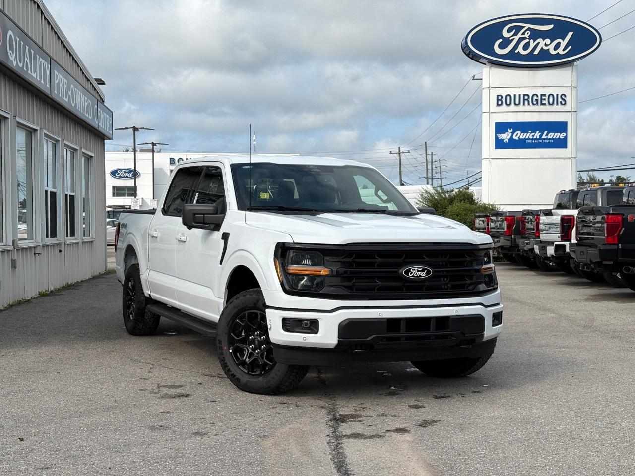 <p>The 2026 Ford F-150 XLT 4WD SuperCrew in a striking Oxford White color is engineered for robust performance and reliable handling with its 4x4 drivetrain and advanced suspension. Designed to tackle all terrains, this truck is perfect for those who demand both style and functionality.</p><p>The crisp white exterior is complemented by a sophisticated black interior, offering a blend of elegance and comfort. Inside, you'll find a spacious cabin lined with premium materials and practical features that make every drive enjoyable, from the intuitive smart device integration to power windows and a panoramic view courtesy of the backup camera.</p><p>Stay connected and secure with cutting-edge technology like the Bluetooth connection, a convenient keyless entry system, and a safety suite featuring lane assist, parking sensors, and brake assist. Stay entertained with satellite radio and Wi-Fi hotspot capabilities, ensuring passengers enjoy every journey.</p><p>This Ford F-150 is ideal for families and adventurers needing versatile storage solutions, thanks to the Bed Utility Package that includes LED box lighting and pick-up box tie-down plates. With the Tough Bed Spray-In Bedliner, this truck is ready for your toughest jobs. Automakers designed the ENGINE: 2.7L V6 ECOBOOST with auto start/stop technology and the Electronic 10-Speed Automatic Transmission to deliver optimal performance with selectable drive modes, tailored for anything from city commuting to off-road escapades.</p><p>Whether you're a professional seeking a capable workhorse or an outdoor enthusiast wanting a reliable partner, this Ford F-150 meets diverse needs effortlessly. Contact Bourgeois Motors Ltd. today to schedule a test drive and learn more about the possibilities with this impressive truck.</p> <p><span style=color:rgb( 58 , 80 , 95 )>The discount shown on vehicle represents the </span><u>Cash Purchase</u><span style=color:rgb( 58 , 80 , 95 )> discount and is inclusive of all non-stackable and stackable cash purchase discounts from Ford of Canada and Bourgeois Motors Ltd. and is offered in lieu of sub-vented lease or finance rates. To get details on current discounts applicable to this and other vehicles in our inventory for Lease and Finance customer, see a member of our team. All offers for lease or finance are On Approved Credit (OAC).While every effort is made to ensure the accuracy of discounts and programs, programs are subject to change without notice </span><span style=color:rgb( 119 , 119 , 119 )>and may not be accurate or completely current. While every reasonable effort is made to ensure the accuracy of this data, we are not responsible for any errors or omissions contained on these pages.</span></p> <p><strong>Why Choose the Bourgeois Auto Group?</strong></p><p>For 80 years, Bourgeois Auto Group has been delivering exceptional automotive experiences. Our factor trained teams work to ensure you receive the shopping experience you deserve; whether you're looking for a new or new-to-you vehicle.</p><p>Shop 24/7 with our online showroom and chat service, ensuring convenience every step of the way. No hidden fees, full disclosure, and every pre-owned vehicle comes with a Carfax® report for peace of mind.</p><p>We offer a wide selection of pre-owned vehicles, all competitively priced using real-time market data. Get the best deal on your purchase and trade-in with our free Live Market Analysis report.</p><p>Looking to sell your car? We buy any make or modelno purchase required. Our simple to use online trade valuation tool will provide you with a clear, transparent selling experience whether you buy our car or not.</p><p>Backed by hundreds dedicated employees across 4 convenient locations, were here to meet all your automotive needs. Visit us in Midland or Parry Sound and explore our inventory or schedule your next service today.</p> <p><strong>Financing Your Next Vehicle with Bourgeois Motors Ford in Midland:</strong></p><p>At Bourgeois Motors Ford, we make financing your next vehicle simple and stress-free! Our team works with trusted lenders to find flexible options tailored to your budget. Drive away with confidenceapply today!</p><p>Take advantage of our online pre-qualification tool, backed by Equifax and TD Bank to find the payment that works for you. Simply <a href=https://www.bourgeoismotors.com/free-credit-check/ rel=nofollow><strong>CLICK HERE</strong></a><strong> </strong>to use our secure online credit tool with no impact to your credit.</p>
