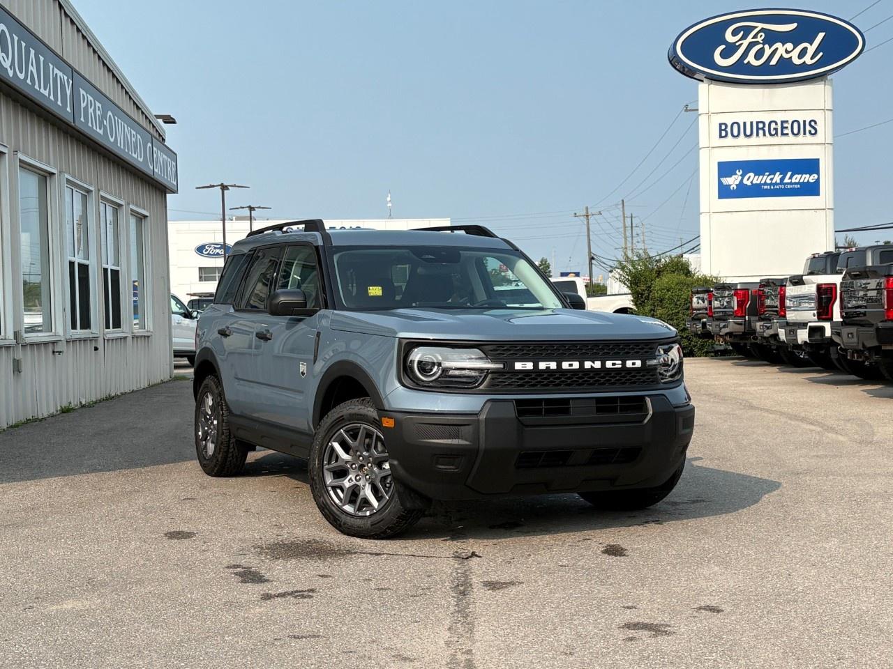 <p>The 2026 Ford Bronco Sport Big Bend, with its sleek gray exterior and 4x4 drivetrain, is perfect for handling both urban roads and off-road adventures. Its stylish 17" carbonized grey-painted aluminum wheels, paired with all-terrain tires, ensure you make a statement wherever you go. The body type and color give it a rugged yet sophisticated look, ideal for any setting.</p> <p>Inside, you'll find a comfortable and modern interior featuring a smart black color scheme. This SUV is equipped with desirable features like heated seats, power windows, and air conditioning to keep you comfortable in every season. Keyless entry simplifies your day-to-day routine, while the rubberized seatback mat adds practicality for your adventurous lifestyle.</p> <p>On the technology front, the Bronco Sport boasts impressive components like a user-friendly backup camera, satellite radio, and Bluetooth connectivity to keep you connected and entertained. Safety and driver assistance take center stage with lane assist, adaptive cruise control, and brake assist features. The terrain management system with multiple modes ensures the Bronco Sport is ready for any challenge, enhancing both driving safety and pleasure.</p> <p>Perfect for outdoor enthusiasts, daily commuters, or anyone in search of a reliable and versatile SUV, the 2026 Ford Bronco Sport Big Bend 4x4 is an excellent choice. Contact Bourgeois Motors Ltd. for more information on this exciting new vehicle and to schedule a test drive today.</p> <p><span style=color:rgb( 58 , 80 , 95 )>The discount shown on vehicle represents the </span><u>Cash Purchase</u><span style=color:rgb( 58 , 80 , 95 )> discount and is inclusive of all non-stackable and stackable cash purchase discounts from Ford of Canada and Bourgeois Motors Ltd. and is offered in lieu of sub-vented lease or finance rates. To get details on current discounts applicable to this and other vehicles in our inventory for Lease and Finance customer, see a member of our team. All offers for lease or finance are On Approved Credit (OAC).While every effort is made to ensure the accuracy of discounts and programs, programs are subject to change without notice </span><span style=color:rgb( 119 , 119 , 119 )>and may not be accurate or completely current. While every reasonable effort is made to ensure the accuracy of this data, we are not responsible for any errors or omissions contained on these pages.</span></p> <p><strong>Why Choose the Bourgeois Auto Group?</strong></p><p>For 80 years, Bourgeois Auto Group has been delivering exceptional automotive experiences. Our factor trained teams work to ensure you receive the shopping experience you deserve; whether you're looking for a new or new-to-you vehicle.</p><p>Shop 24/7 with our online showroom and chat service, ensuring convenience every step of the way. No hidden fees, full disclosure, and every pre-owned vehicle comes with a Carfax® report for peace of mind.</p><p>We offer a wide selection of pre-owned vehicles, all competitively priced using real-time market data. Get the best deal on your purchase and trade-in with our free Live Market Analysis report.</p><p>Looking to sell your car? We buy any make or modelno purchase required. Our simple to use online trade valuation tool will provide you with a clear, transparent selling experience whether you buy our car or not.</p><p>Backed by hundreds dedicated employees across 4 convenient locations, were here to meet all your automotive needs. Visit us in Midland or Parry Sound and explore our inventory or schedule your next service today.</p> <p><strong>Financing Your Next Vehicle with Bourgeois Motors Ford in Midland:</strong></p><p>At Bourgeois Motors Ford, we make financing your next vehicle simple and stress-free! Our team works with trusted lenders to find flexible options tailored to your budget. Drive away with confidenceapply today!</p><p>Take advantage of our online pre-qualification tool, backed by Equifax and TD Bank to find the payment that works for you. Simply <a href=https://www.bourgeoismotors.com/free-credit-check/ rel=nofollow><strong>CLICK HERE</strong></a><strong> </strong>to use our secure online credit tool with no impact to your credit.</p>