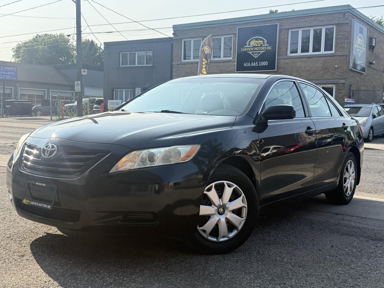 2009 Toyota Camry LE - Photo #1