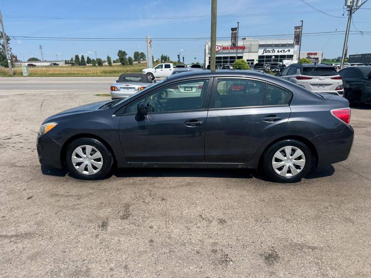 2014 Subaru Impreza AS IS SPECIAL, 2.0i w/Touring Pkg, RUNS WELL Photo