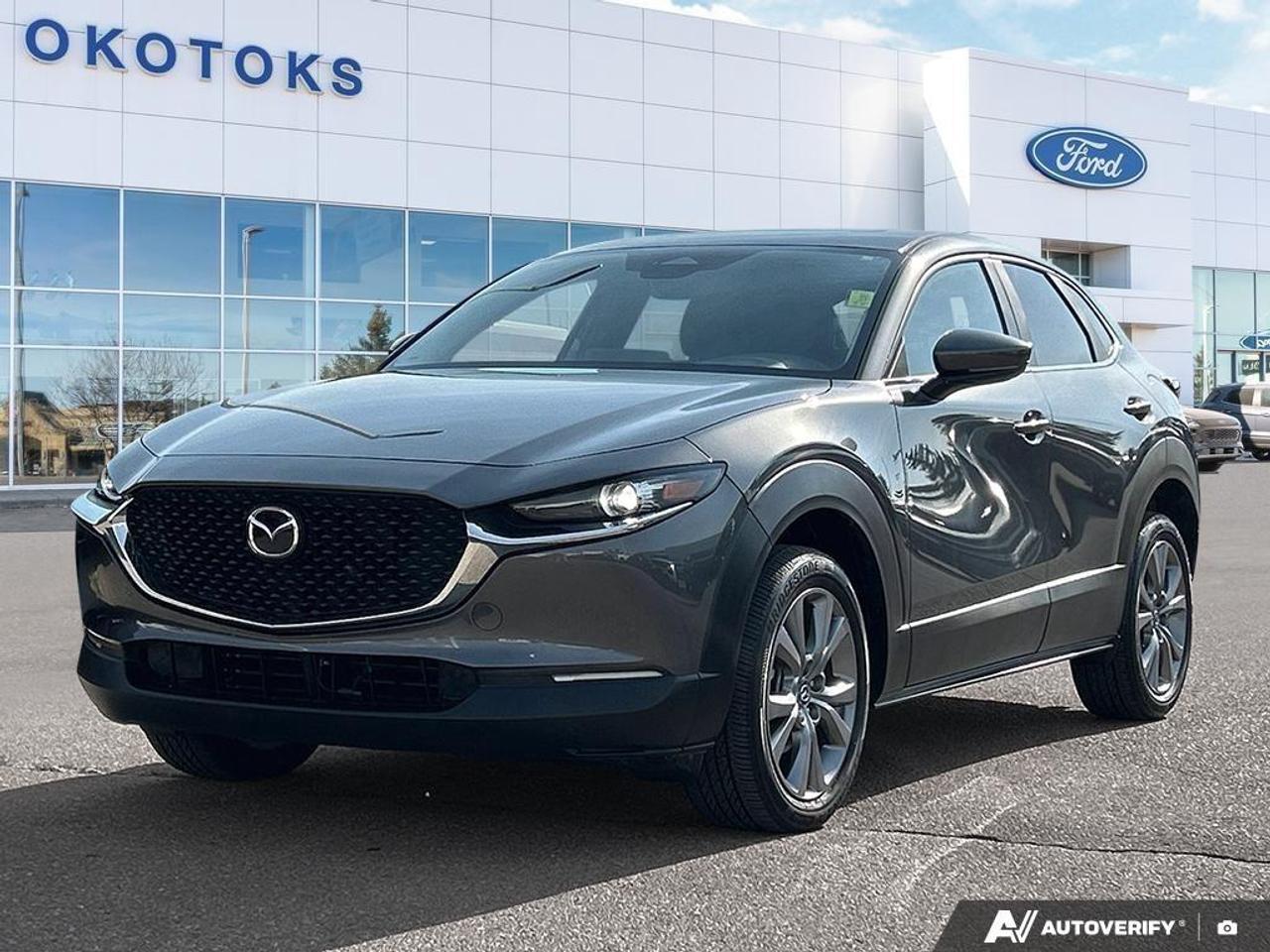 <p>This <strong>2025 Mazda CX-30 GS AWD</strong> comes to us ready for its next home with a clean, local Alberta history and personal previous use. Documented maintenance visits at Kramer Mazda and Great Canadian Oil Change show it has been looked after properly from day one. Most recently, it received a thorough mechanical fitness assessment and professional reconditioning to give you complete peace of mind.</p><ul><li><p>Comprehensive Mechanical Fitness Assessment and Quality Care Inspection completed under RO #479225</p></li><li><p>Professional replacement of the <strong>windshield</strong> via All Makes Glass</p></li><li><p>New <strong>cabin air filter</strong> installed</p></li><li><p>Professional <strong>wheel etch service</strong> applied</p></li><li><p>Strong wearable components with <strong>7/32" front and 8/32" rear tire tread</strong> plus healthy <strong>8mm brake pads</strong> all around</p></li></ul><p>According to the Carfax report, this crossover features a <strong>clean history with no reported accidents or damage</strong>, zero U.S. history, and no open recalls.</p><ul><li><p><strong>i-Activ All-Wheel Drive</strong> provides confident handling by continuously monitoring road conditions and shifting power to the wheels that need it most.</p></li><li><p><strong>Responsive 2.5L Engine</strong> paired with a smooth six-speed automatic transmission offers a great blend of everyday power and highway efficiency.</p></li><li><p><strong>18-Inch Alloy Wheels</strong> give the exterior a grounded, stylish stance while supporting a smooth ride.</p></li><li><p><strong>Heated Front Seats and Steering Wheel</strong> deliver essential warmth and comfort during cold Canadian winter mornings.</p></li><li><p><strong>Apple CarPlay and Android Auto Integration</strong> lets you easily access your favourite navigation and media apps through the central display.</p></li><li><p><strong>Bluetooth Hands-Free Capability</strong> keeps you connected to calls and audio safely while keeping your hands on the wheel.</p></li></ul><p>Text or Call us today at Okotoks Ford Lincoln for a personalized video walk-around or to book your test drive of this vehicle.</p>