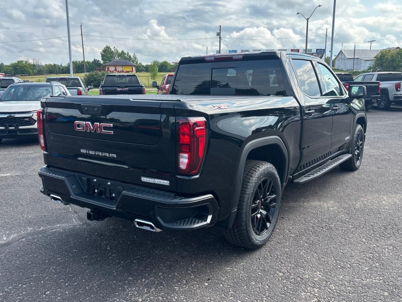 2026 GMC Sierra 1500 Elevation New 5 Passenger V8 Crew Cab 4X4 Truck with Leather Package, Heated Front Seats, Heated Steering Wheel, Power Sunroof, Hard Folding Tonneau Cover and a 13.4 Diagonal Touchscreen Radio with Google Built Photo
