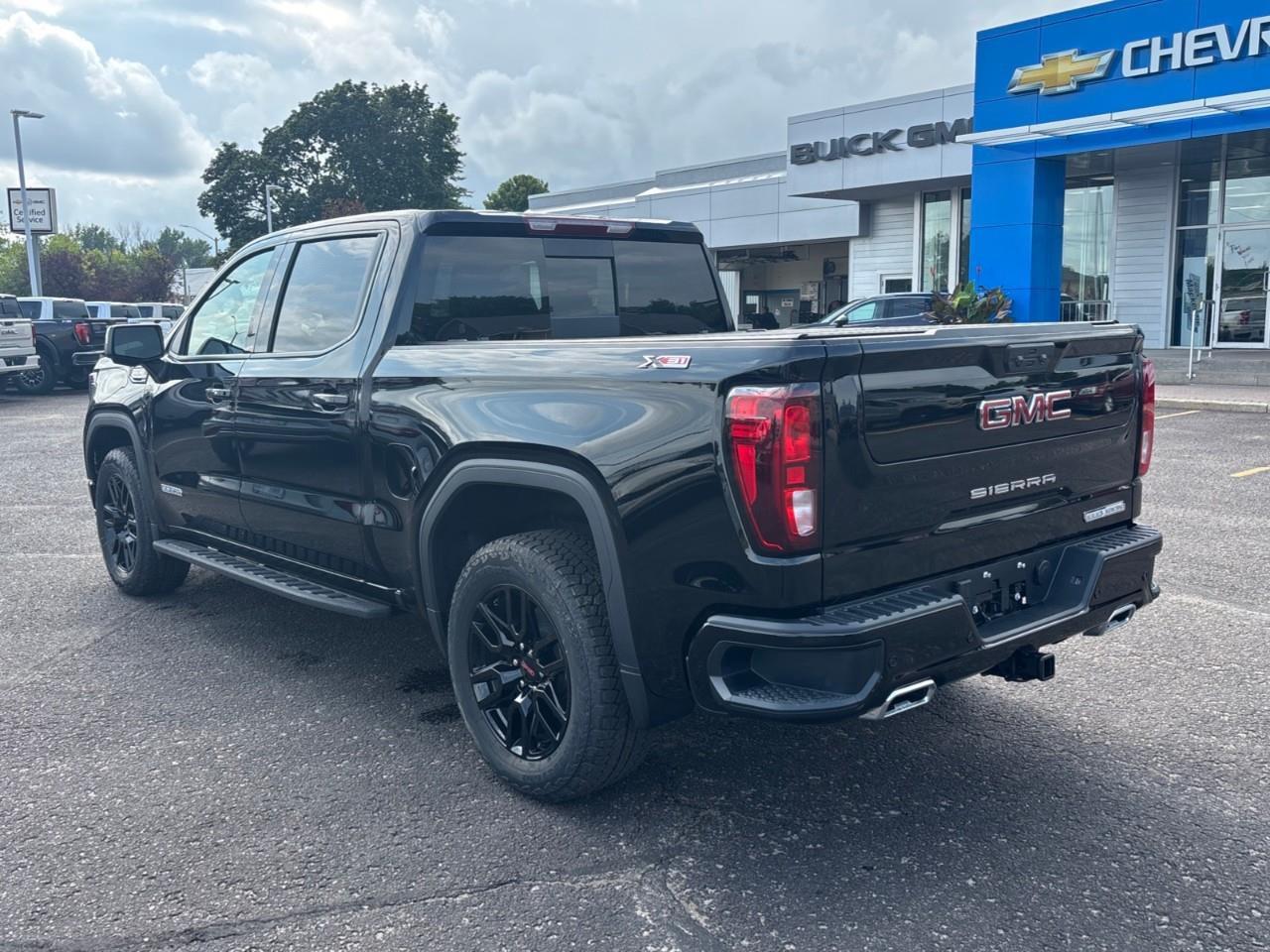 2026 GMC Sierra 1500 Elevation New 5 Passenger V8 Crew Cab 4X4 Truck with Leather Package, Heated Front Seats, Heated Steering Wheel, Power Sunroof, Hard Folding Tonneau Cover and a 13.4 Diagonal Touchscreen Radio with Google Built Photo