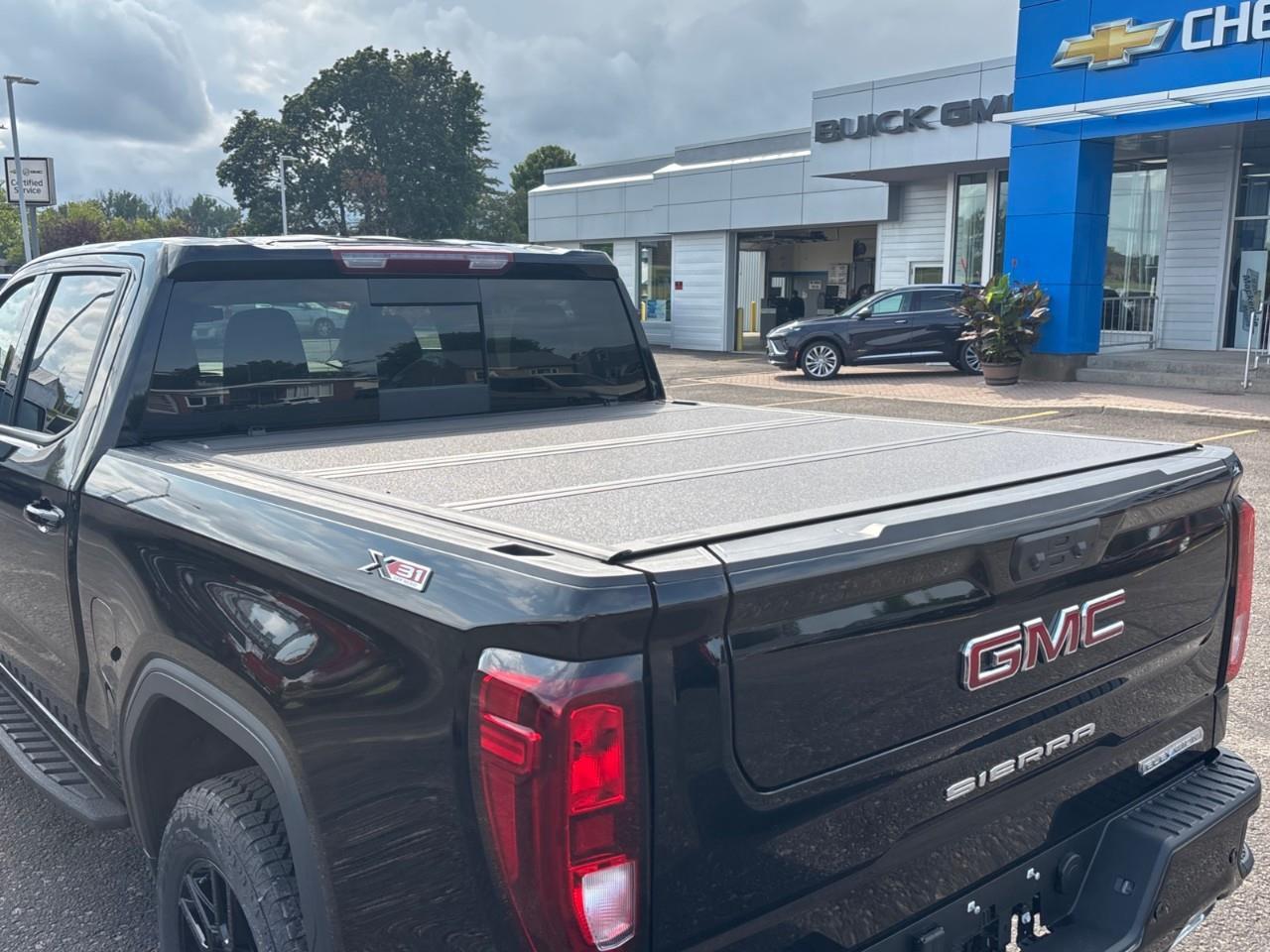 2026 GMC Sierra 1500 Elevation New 5 Passenger V8 Crew Cab 4X4 Truck with Leather Package, Heated Front Seats, Heated Steering Wheel, Power Sunroof, Hard Folding Tonneau Cover and a 13.4 Diagonal Touchscreen Radio with Google Built Photo