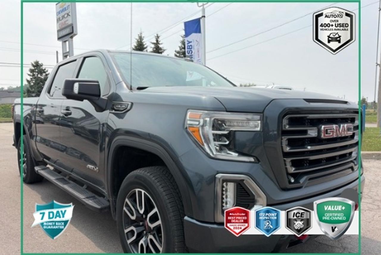 Recent Arrival!<br><br><br>One Owner, | Apple CarPlay/Android Auto, | Non-Smoker, LOCAL TRADE, NEW BRAKES, 8-Speed Automatic, 4WD, Jet Black With Kalahari Accents Leather, 10-Way Power Driver Seat Adjuster w/Lumbar, 10-Way Power Passenger Seat Adjuster w/Lumbar, 12-Volt Rear Auxiliary Power Outlet, 120-Volt Bed Mounted Power Outlet, 120-Volt Instrument Panel Power Outlet, 170 Amp Alternator, 2 USB Ports, 2 USB Ports (1st Row), 3.23 Rear Axle Ratio, 4.2 Diagonal Colour Display Driver Info Centre, 6-Speaker Audio System Feature, 6 Rectangular Black Tubular Assist Steps (LPO), All-Weather Floor Liner (LPO), Alloy wheels, Apple CarPlay/Android Auto, AT4 Preferred Package, AT4 Premium Package, Auto-dimming door mirrors, Auto-dimming Rear-View mirror, Automatic temperature control, Auxiliary External Transmission Oil Cooler, Body-Colour Surround Grille, Bumpers: body-colour, Colour-Keyed Carpeting Floor Covering, Compass, Deep-Tinted Glass, Delay-off headlights, Driver Alert Package I, Driver Memory, Dual front impact airbags, Dual front side impact airbags, Electric Rear-Window Defogger, Electrical Lock Control Steering Column, Exterior Parking Camera Rear, Floor Mounted Console, Front anti-roll bar, Front Bucket Seats, Front fog lights, Front wheel independent suspension, Fully automatic headlights, GMC 4G LTE, GMC Connected Access, HD Radio, HD Rear Vision Camera, Heated 2nd Row Outboard Seats, Heated Driver & Front Passenger Seating, Heated steering wheel, Heavy-Duty Rear Locking Differential, High-Capacity Air Filter, Hill Descent Control, Hitch Guidance, Hitch Guidance w/Hitch View, In-Vehicle Trailering App, Integrated Trailer Brake Controller, Keyless Open & Start, Lane Change Alert w/Side Blind Zone Alert, LED Cargo Area Lighting, Low tire pressure warning, Manual Tilt-Wheel & Telescoping Steering Column, Memory seat, Occupant sensing airbag, OnStar & GMC Connected Services Capable, Overhead airbag, Panic alarm, Perimeter Lighting, Power Door Locks, Power driver seat, Power Front Passenger Windows w/Express Up/Down, Power Front Windows w/Driver Express Up/Down, Power Rear Windows w/Express Down, Power Sliding Rear Window w/Rear Defogger, Power Sunroof, Preferred Equipment Group 4SB, Premium Bose 7-Speaker Sound System, Radio: Premium GMC Infotainment Sys w/Multi-Touch, Radio: Premium GMC Infotainment Sys w/Navigation, Rear Cross Traffic Alert, Rear Dual USB Charging-Only Ports, Rear step bumper, Rear Wheelhouse Liners, Red Recovery Hooks, Remote Vehicle Starter System, Security system, SiriusXM, Split folding rear seat, Spray-On Pickup Bed Liner w/AT4 Logo, Steering Wheel Audio Controls, Theft Deterrent System (Unauthorized Entry), Trailer Tire Pressure Monitor System, Trailering Package, Ultrasonic Front & Rear Park Assist, Universal Home Remote, Ventilated Driver & Front Passenger Seats, Wheel Locks (Set of 4) (LPO), Wheels: 20 x 9 Machined Aluminum, Wireless Charging.<br><br>Dark Sky Metallic AT4<br>NAVIGATION | HEATED SEATS | HEATED STEERING WHEEL | DRIVER ALERT PKG | RUNNING BOARDS | 2019 GMC Sierra 1500 AT4 1FTFW1E50PKF28137 | EcoTec3 5.3L V8<br>8-Speed Automatic<br>4WD<p> </p>

<h4>VALUE+ CERTIFIED PRE-OWNED VEHICLE</h4>

<p>
- 36-point Provincial Safety Inspection<br>
- 172-point inspection combined mechanical, aesthetic, functional inspection including a vehicle report card<br>
- Warranty: 30 Days or 1500 KMS on mechanical safety-related items and extended plans are available<br>
- Complimentary CARFAX Vehicle History Report<br>
- 2X Provincial safety standard for tire tread depth<br>
- 2X Provincial safety standard for brake pad thickness<br>
- 7 Day Money Back Guarantee*<br>
- Market Value Report provided<br>
- Complimentary 3 months SIRIUS XM satellite radio subscription on equipped vehicles<br>
- Complimentary wash and vacuum<br>
- Vehicle scanned for open recall notifications from manufacturer
</p>

<p>SPECIAL NOTE: This vehicle is reserved for AutoIQs retail customers only. Please, No dealer calls. Errors & omissions excepted.</p>

<p>*As-traded, specialty or high-performance vehicles are excluded from the 7-Day Money Back Guarantee Program (including, but not limited to Ford Shelby, Ford mustang GT, Ford Raptor, Chevrolet Corvette, Camaro 2SS, Camaro ZL1, V-Series Cadillac, Dodge/Jeep SRT, Hyundai N Line, all electric models)</p>