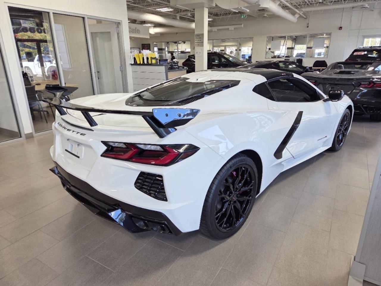 2027 Chevrolet Corvette 1LT  HIGH WING SPOILER | TRANSPARENT ROOF | GLOSS BLACK FORGED WHEELS Photo