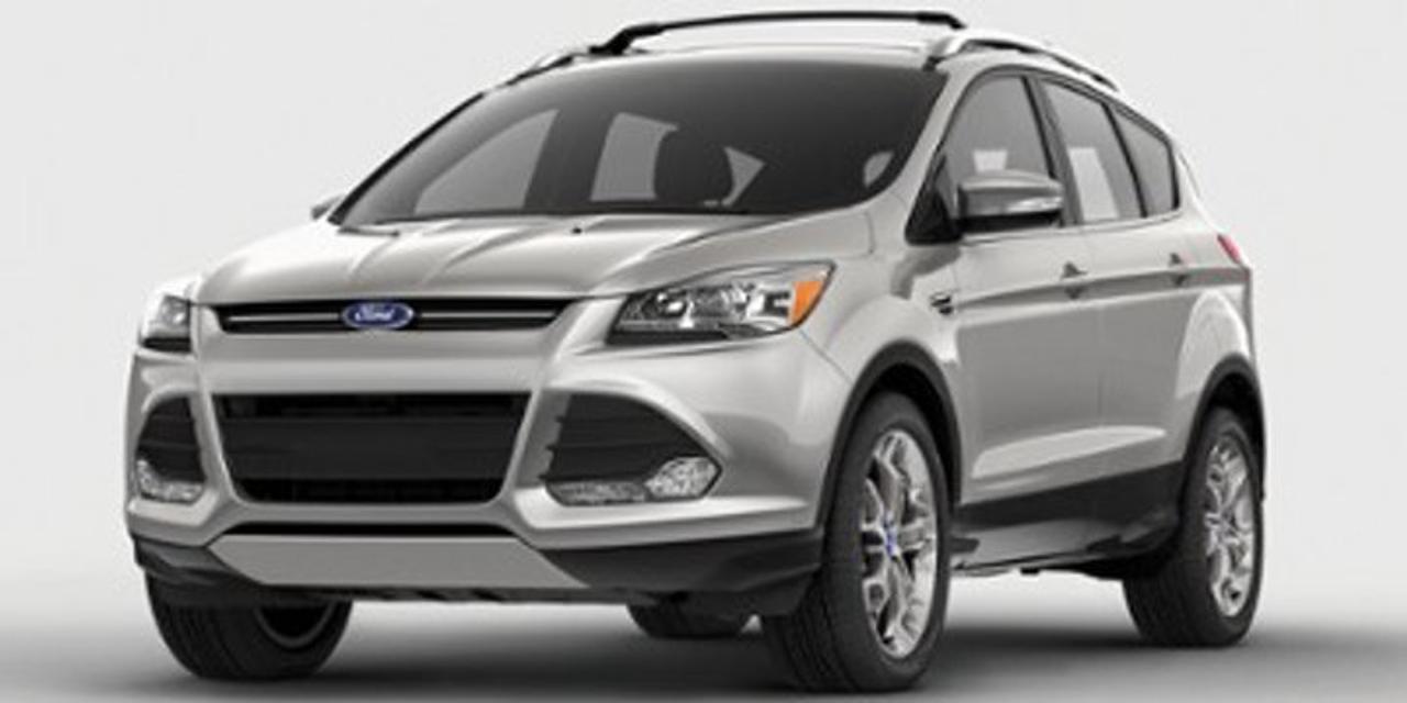 This Silver Ford Escape SE is sleek, smart and more fun than ever! It has the best automatic highway fuel economy in its class. It comes with a 4WD Intercooled Turbo Regular Unleaded I-4 2.0 L/122 engine. There are tons of neat features to impress your friends! Bluetooth capability allows you to make hands-free calls, and you can connect your smart phone to play your tunes. It has a SYNC voice activated communications and entertainment system, steering wheel audio controls, USB port, audio input jack and 911 assist. Safety features include dual-stage front airbags, a safety canopy system with side-curtain airbags and rollover sensor. The front bucket seats are heated and will keep you toasty warm in the winter. Contact us today to test drive this Ford Escape SE!Check out this vehicles pictures, features, options and specs, and let us know if you have any questions. Helping find the perfect vehicle FOR YOU is our only priority.P.S...Sometimes texting is easier. Text (or call) 1-204-900-8266 for fast answers at your fingertips!Dealer Permit #4697