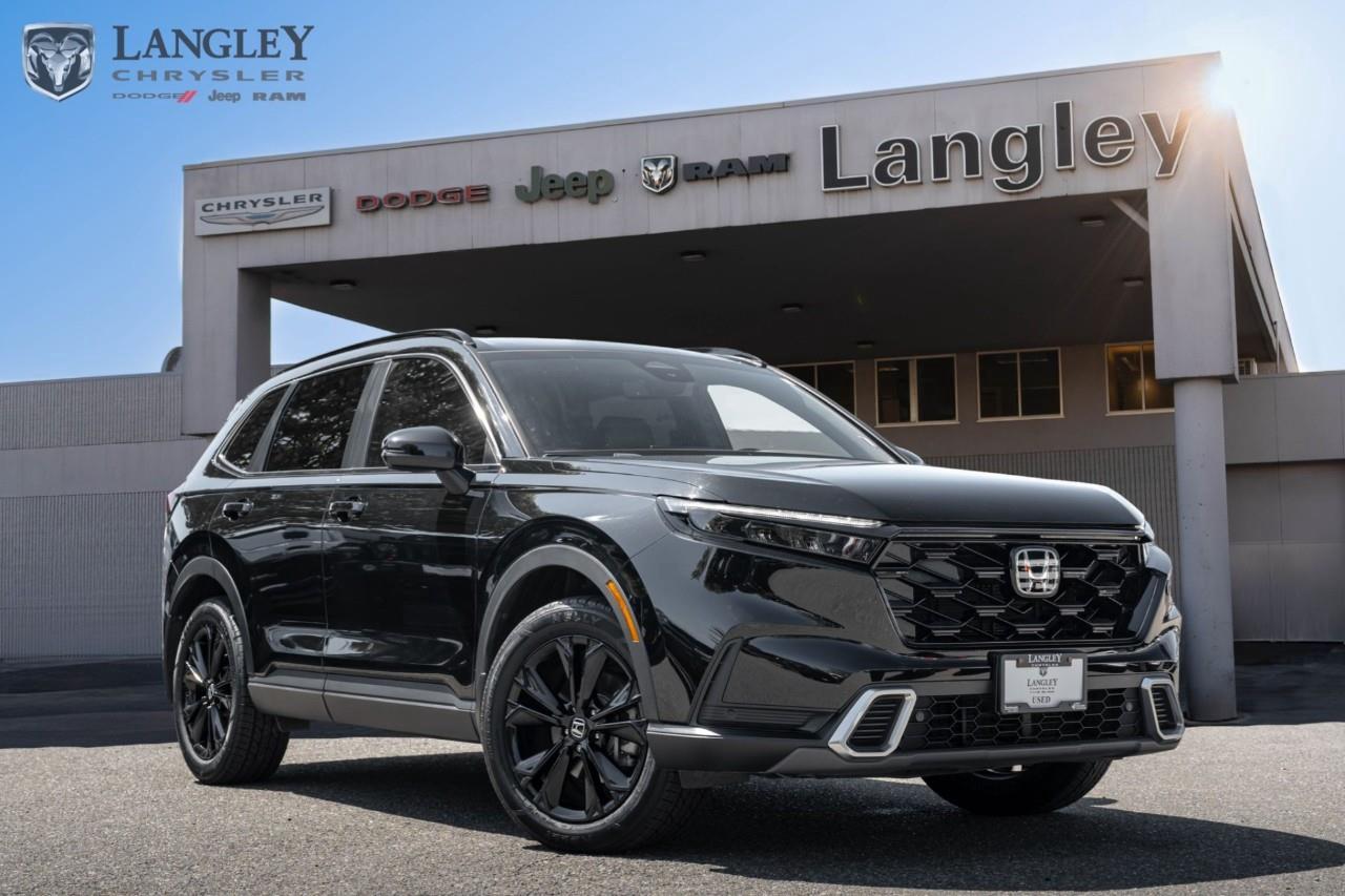 <p><strong>2025 Honda CR-V Hybrid Touring Touring AWD</strong></p><p>A practical hybrid SUV equipped with all-wheel drive and high fuel efficiency.</p><ul><li><p><strong>Engine</strong>: 2.0L 4-cylinder hybrid system (204 hp, 247 lb-ft torque)</p></li><li><p><strong>Transmission</strong>: Electronic Continuously Variable Transmission (e-CVT)</p></li><li><p><strong>Drivetrain</strong>: Real Time All-Wheel Drive (AWD)</p></li><li><p><strong>Fuel Economy</strong>: 6.0 L/100 km city / 6.9 L/100 km highway</p></li><li><p><strong>Cargo Capacity</strong>: Up to 2,030 L with rear seats folded</p></li></ul><p>Come book a test drive at Langley Chrysler, conveniently located in Langley, British Columbia.</p>

<p>*All prices plus applicable taxes, applicable environmental recovery charges, documentation of $599 and full tank of fuel surcharge of $76 if a full tank is chosen. <br />Other protection items available that are not included in the above price:<br />Tire & Rim Protection and Key fob insurance starting from $599<br />Service contracts (extended warranties) for coverage up to 7 years and 200,000 kms starting from $599<br />Custom vehicle accessory packages, mudflaps and deflectors, tire and rim packages, lift kits, exhaust kits and tonneau covers, canopies and much more that can be added to your payment at time of purchase<br />Undercoating, rust modules, and full protection packages starting from $199<br />Financing Fee of $500 when applicable<br />Flexible life, disability and critical illness insurances to protect portions of or the entire length of vehicle loan</p>