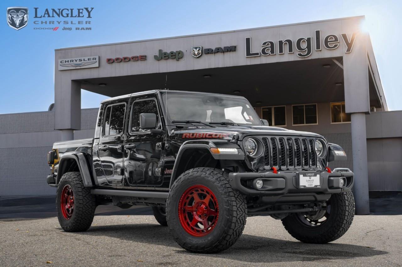 <p><strong>2023 Jeep Gladiator Rubicon Rubicon 4x4</strong></p><p>A rugged midsize pickup truck built for serious trail crawling and heavy towing.</p><ul><li><p><strong>Engine</strong>: 3.6L Pentastar V6 (285 hp, 260 lb-ft torque)</p></li><li><p><strong>Transmission</strong>: 8-speed automatic</p></li><li><p><strong>Drivetrain</strong>: 4x4 Rock-Trac system</p></li><li><p><strong>Max Towing</strong>: Up to 7,000 lbs</p></li><li><p><strong>Key Feature</strong>: 33-inch all-terrain tires and locking differentials</p></li></ul><p>Come book a test drive at Langley Chrysler, conveniently located in Langley, British Columbia.</p>

<p>*All prices plus applicable taxes, applicable environmental recovery charges, documentation of $599 and full tank of fuel surcharge of $76 if a full tank is chosen. <br />Other protection items available that are not included in the above price:<br />Tire & Rim Protection and Key fob insurance starting from $599<br />Service contracts (extended warranties) for coverage up to 7 years and 200,000 kms starting from $599<br />Custom vehicle accessory packages, mudflaps and deflectors, tire and rim packages, lift kits, exhaust kits and tonneau covers, canopies and much more that can be added to your payment at time of purchase<br />Undercoating, rust modules, and full protection packages starting from $199<br />Financing Fee of $500 when applicable<br />Flexible life, disability and critical illness insurances to protect portions of or the entire length of vehicle loan</p>