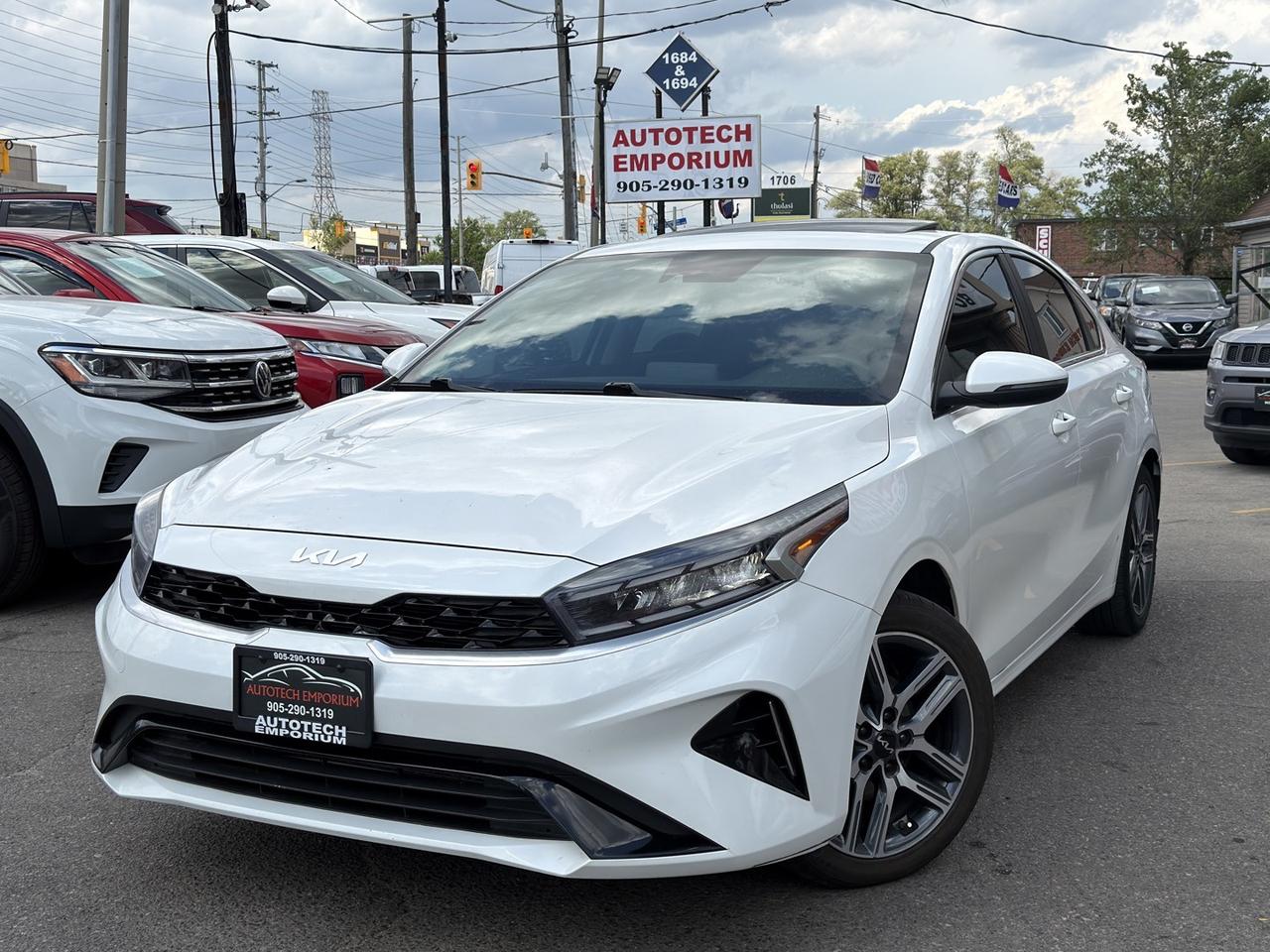 2023 Kia Forte EX Plus Pearl White Sunroof   Htd Steering   Lane Photo