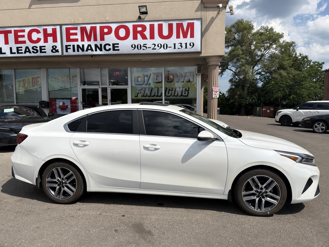 2023 Kia Forte EX Plus Pearl White Sunroof   Htd Steering   Lane Photo