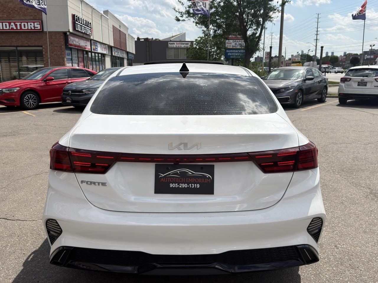 2023 Kia Forte EX Plus Pearl White Sunroof   Htd Steering   Lane Photo
