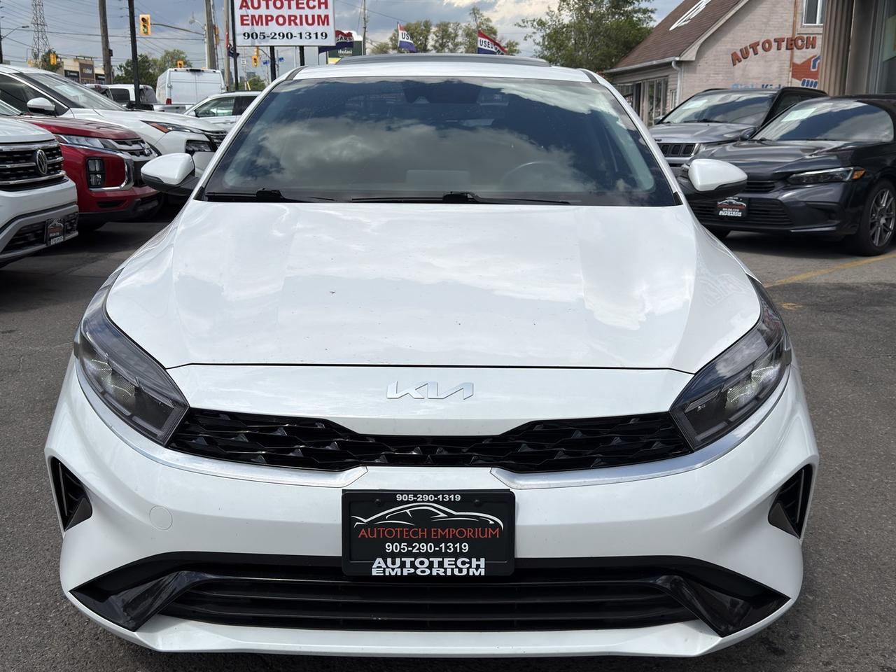 2023 Kia Forte EX Plus Pearl White Sunroof   Htd Steering   Lane Photo