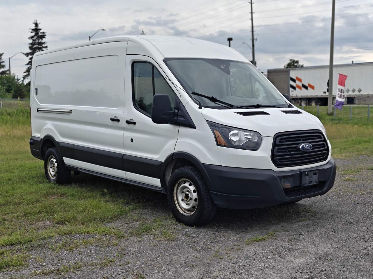 2019 Ford Transit-250 Base w/Sliding Pass-Side Cargo Door Medium Roof Cargo Van 147.6 in. WB Photo