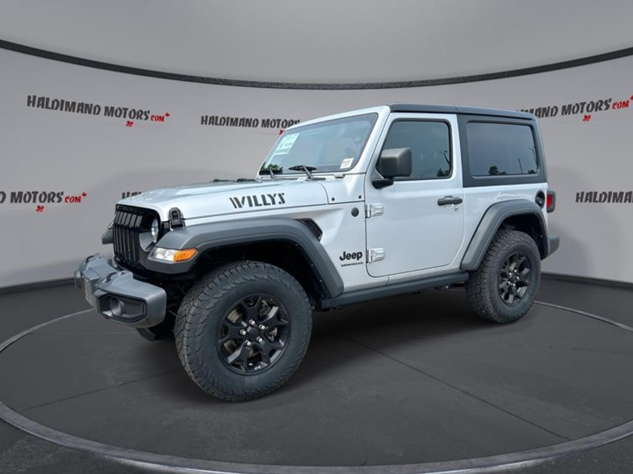 // ACCIDENT FREE!! //<br />// SINGLE OWNER! //<br /><br />Built for open-air freedom and real trail ability, this 2023 Jeep Wrangler 2 Door Willys 4x4 is ready for work, weekends, and everything in between. Offered by Haldimand Motors Ltd. in Cayuga, this used SUV is accident free, single owner, and shows 54,102 km on the odometer.<br /><br />Finished in Silver with a Black interior, this 2023 Jeep Wrangler 2 Door Willys 4x4 blends classic Jeep style with useful modern features. Its automatic transmission and 2.0-litre gas engine deliver easy daily driving, while the two-door layout keeps the look compact, agile, and true to its off-road roots.<br /><br />The Willys name is well known among Jeep fans for adding extra off-road character. This 2023 Jeep Wrangler 2 Door Willys 4x4 stands out with off-road tires, four-wheel drive, a rear tow hook, and a limited slip differential. It is a smart choice for drivers who want strong capability without giving up comfort and connectivity.<br /><br />FEATURES OF THE Wrangler 2 Door Willys 4x4 | One Owner | No Accidents<br /><br />   Willys trim adds classic off-road appeal<br />   Two-door body feels nimble and fun<br />   Four-wheel drive boosts year-round confidence<br />   Off-road tires support rugged terrain use<br /><br />ADVANCED SAFETY FEATURES<br /><br />   Backup camera helps with tight parking<br />   Anti-lock braking system supports safer stops<br />   Stability control adds confident road manners<br />   Side impact airbags enhance occupant protection<br /><br />PERFORMANCE AND EFFICIENCY<br /><br />   2.0-litre gas engine delivers solid response<br />   Automatic transmission supports smooth daily driving<br />   Limited slip differential improves traction control<br />   Four-wheel drive handles rough conditions well<br /><br />COMFORT AND CONVENIENCE<br /><br />   Front air conditioning keeps cabin comfortable<br />   Power windows add everyday driving ease<br />   Cruise control supports relaxed highway trips<br />   Driver lumbar support improves seat comfort<br /><br />TECHNONOLGY AND CONNECTIVITY<br /><br />   Navigation system helps guide every trip<br />   Apple CarPlay adds familiar smartphone access<br />   Android Auto keeps apps within reach<br />   Bluetooth integration supports hands-free communication<br /><br />CARGO SPACE<br /><br />   Rear area suits daily gear storage<br />   Compact body remains easy to load<br />   Spare tire adds travel peace of mind<br />   Two-door design keeps essentials close by<br /><br />AWARDS & RECOGNITIONS<br /><br />   Best Resale Value Award, Canadian Black Book, 2023<br />   Highest Ranked Midsize SUV, J.D. Power, 2023<br /><br />WHAT OTHER OWNERS LIKE<br /><br />   Removable roof adds open-air driving fun<br />   Strong off-road ability inspires weekend adventures<br />   Compact size helps urban maneuvering ease<br />   Modern tech makes trips more connected<br /><br />This Jeep is also equipped with power steering, tinted windows, automatic headlights, steering wheel audio controls, an adjustable steering wheel, push button start, tire pressure monitoring, driver airbag, passenger airbag, and a passenger airbag sensor. These features help make each drive simple, practical, and more enjoyable.<br /><br />The cabin keeps things functional and easy to use. Clear controls, supportive seating, and smart connectivity features make this 2023 Jeep Wrangler 2 Door Willys 4x4 a great fit for commuting, road trips, and cottage weekends. The convertible design adds another layer of fun when the weather turns nice.<br /><br />If you want a capable SUV with real Jeep character, this 2023 Jeep Wrangler 2 Door Willys 4x4 deserves a close look. It offers the confidence of no accidents, the value of single-owner history, and the versatility drivers want in Ontario. Visit Haldimand Motors Ltd. in Cayuga to see it for yourself.<br /><br />This 2023 Jeep Wrangler 2 Door Willys 4x4 | One Owner | No Accidentss VIN is: 1C4GJXAN0PW625262.<br /><br />WHY CHOOSE US? <br /><br />Honest & Transparent Buying Experience: Weve been a trusted name in business since 1984.<br /><br />STRAIGHTFORWARD PRICING:<br />Our Advertised Price Includes:<br />>>Safety Certification (No separate fee!)<br />>>30-Day 100% Mechanical Warranty<br />>>FREE Carfax History Report.<br />>>No upcharge for paying cash.<br />(Prices Exclude HST and Licensing Fees only.)<br /><br />>>Browse 300+ vehicles all in ONE LOCATION<br /><br />EASY FINANCING: Great rates & open loans<br /><br />WE BUY CARS: Get Top Dollar for your trade-in, or sell us your vehicle for CASH! Even if you dont buy from us!<br /><br />STOP BY TODAY<br />Treat yourself - stop by Haldimand Motors Ltd. located at 42 Talbot St E, Cayuga, ON N0A 1E0 to make this car yours today!<br /><br />https://www.haldimandmotors.com/used/stock-461041.html