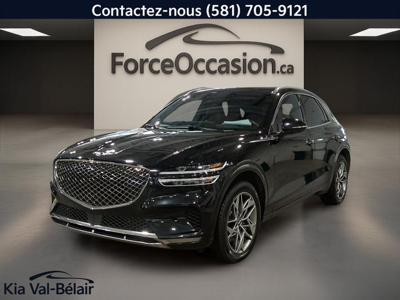 Jamais accidenté // Un seul propriétaire // Inspecté en 135 points

Le Genesis GV70 2023 2.5T Advanced proposé par Kia Val-Bélair combine un moteur turbo de 2,5 litres, une transmission automatique à 8 rapports et un habitacle noir bien équipé. Avec 78 973 km à lodomètre, ce VUS usagé présente aussi un toit ouvrant, la navigation et une caméra 360°.

CARACTÉRISTIQUES DU GV70 2.5T ADVANCED * 300HP * CUIR * TOIT * BI-ZONE * SIÈGES VENTILÉS *
»» Moteur turbo de 2,5 litres de 300 chevaux
»» Système de navigation intégré au tableau central
»» Caméra 360° pour manoeuvres plus précises
»» Toit ouvrant en verre et habitacle noir

CARACTÉRISTIQUES DE SÉCURITÉ AVANCÉES
»» Avertissement de sortie de voie inclus
»» Surveillance des angles morts intégrée
»» Caméra de recul pour stationnement simplifié
»» Contrôle de stabilité et freins ABS

PERFORMANCE ET EFFICACITÉ
»» Moteur 2,5 litres turbo à essence
»» Puissance annoncée de 300 chevaux
»» Transmission automatique à 8 vitesses
»» Direction assistée pour conduite quotidienne aisée

CONFORT
»» Sièges avant chauffants de série
»» Sièges arrière chauffants ajoutent au confort
»» Sièges avant à réglage électrique
»» Climatisation avant, arrière et deux zones

TECHNOLOGIE ET CONNECTIVITÉ
»» Intégration Bluetooth pour appels et audio
»» Système de navigation GPS intégré
»» Commandes audio pratiques au volant
»» Démarrage par bouton-poussoir et à distance

ESPACE DE CHARGEMENT
»» Hayon électrique pour accès facilité
»» Accès au coffre arrière pratique
»» Banquette arrière utile au quotidien
»» Format VUS adapté aux besoins courants

RÉCOMPENSES ET RECONNAISSANCES
»» Top Safety Pick+ 2023, Insurance Institute for Highway Safety

APPRÉCIÉ DES AUTRES PROPRIÉTAIRES
»» Habitacle silencieux et finition soignée
»» Confort des sièges avant et arrière
»» Motorisation turbo vive et souple
»» Technologies daide utiles au quotidien

GARANTIE
»» Garantie légale seulement
»» Garantie dusage
»» Garantie de durée raisonnable
»» Garantie contre les vices cachés

Avec sa carrosserie noire, son intérieur noir, ses quatre portes et son équipement ciblé, ce Genesis GV70 2023 2.5T Advanced offre une présentation sérieuse et actuelle. Il convient bien à lacheteur qui cherche un VUS de luxe usagé avec des éléments précis, utiles et faciles à apprécier au quotidien.

Le NIV de ce Genesis GV70 2.5T ADVANCED * 300HP * CUIR * TOIT * BI-ZONE * SIÈGES VENTILÉS * 2023 est le KMUMADTB4PU110424 .

Garantie prolongée disponible, livraison en 48h