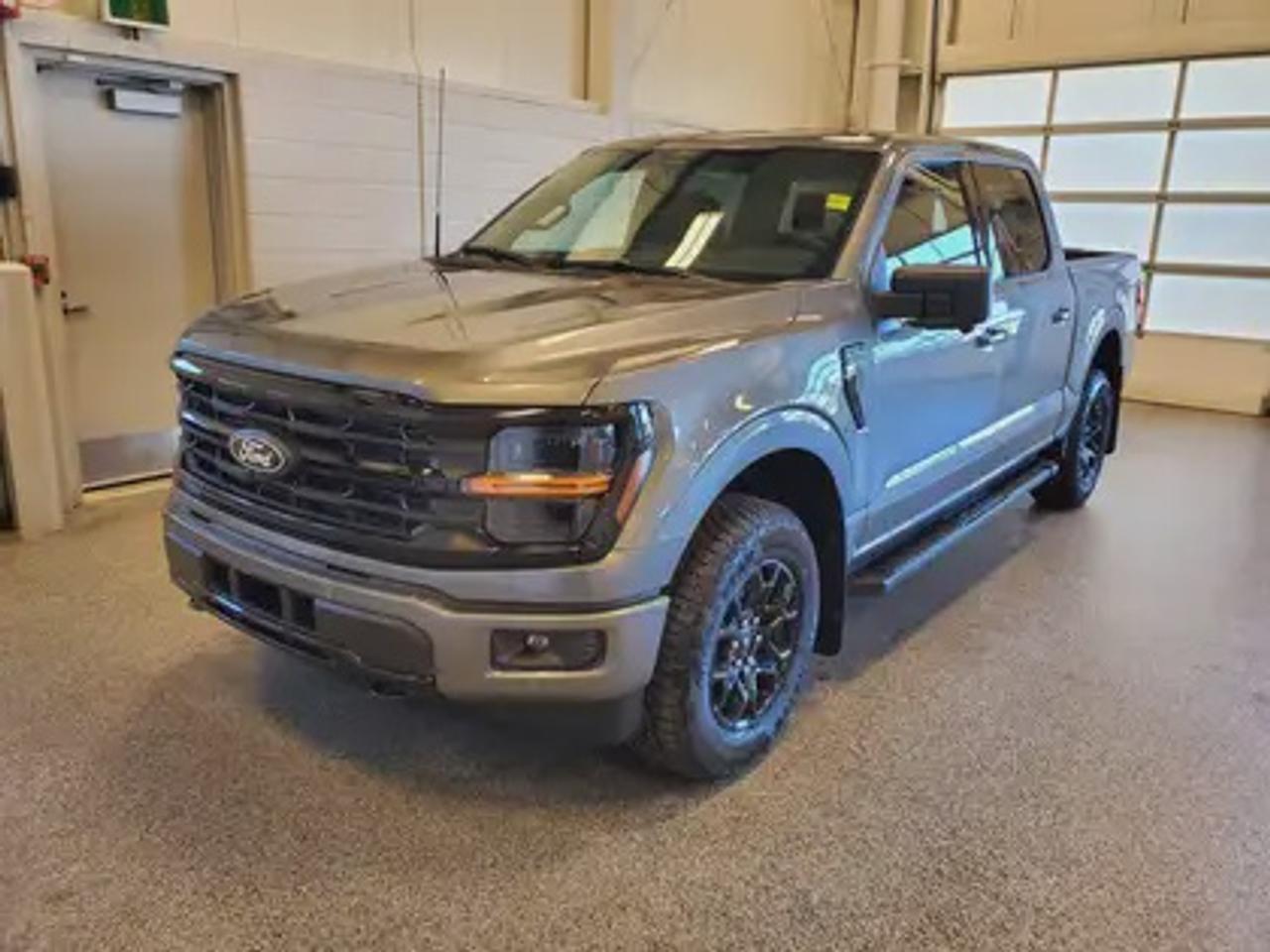 The all-new 2026 Ford F-150 XLT 302A is a statement of style in Carbonized Grey Metallic. Powered by the 2.7L engine, it delivers 325 horsepower and 400 lb-ft of torque, paired with a 10-speed automatic transmission. This truck achieves an impressive, combined fuel economy of 11.8 L/100 km (24 miles per gallon).

Key Features:
12 LCD Captivity Touchscreen
Electronic Power-Assist Steering
Dual-Zone Electronic Auto Temp Control
Cruise Control
Power Windows
AdvanceTrac® With Roll Stability Control
Perimeter Alarm
Ford Co-Pilot360
Lane Keeping System
Rear View Camera
Rear Parking Sensors
Reverse Park Assist
Class IV Trailer Hitch
Power Drivers Seat
Remote Start
SYNC®4
Apple Car Play
18 All Terrain Tires
Bluetooth Connectivity
XLT Black Appearance Package
Engine Block Heater
Bed Utility Package

Moose Jaw Ford, conveniently located at 1010 North Service Road in Moose Jaw, is your trusted destination for all your automotive needs. With an impressive 4.8-star Google rating from nearly 1,500 reviews, we are proud to deliver an exceptional vehicle-buying experience tailored just for you. Our Moose Jaw Motives set us apart, offering unbeatable value like half-priced oil changes for life on pre-owned vehicles, one year of key and remote protection, and one year of tire and rim protection. Enjoy peace of mind with every purchase. At Moose Jaw Ford, were committed to driving positive change in our community by combining exceptional service, high-quality vehicles, and a guest-first approach. Visit us today!