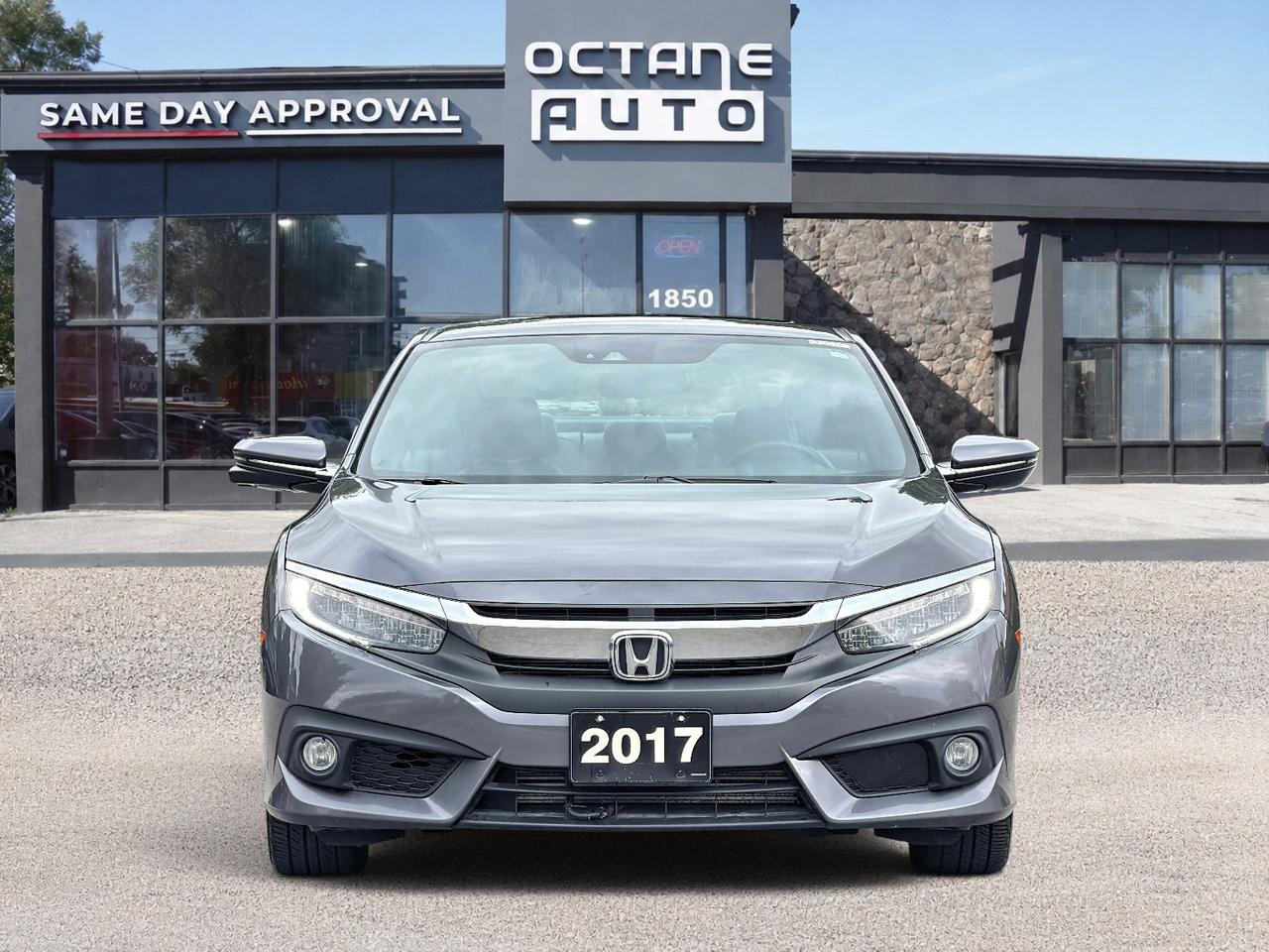 2017 Honda Civic 2dr CVT Touring Photo