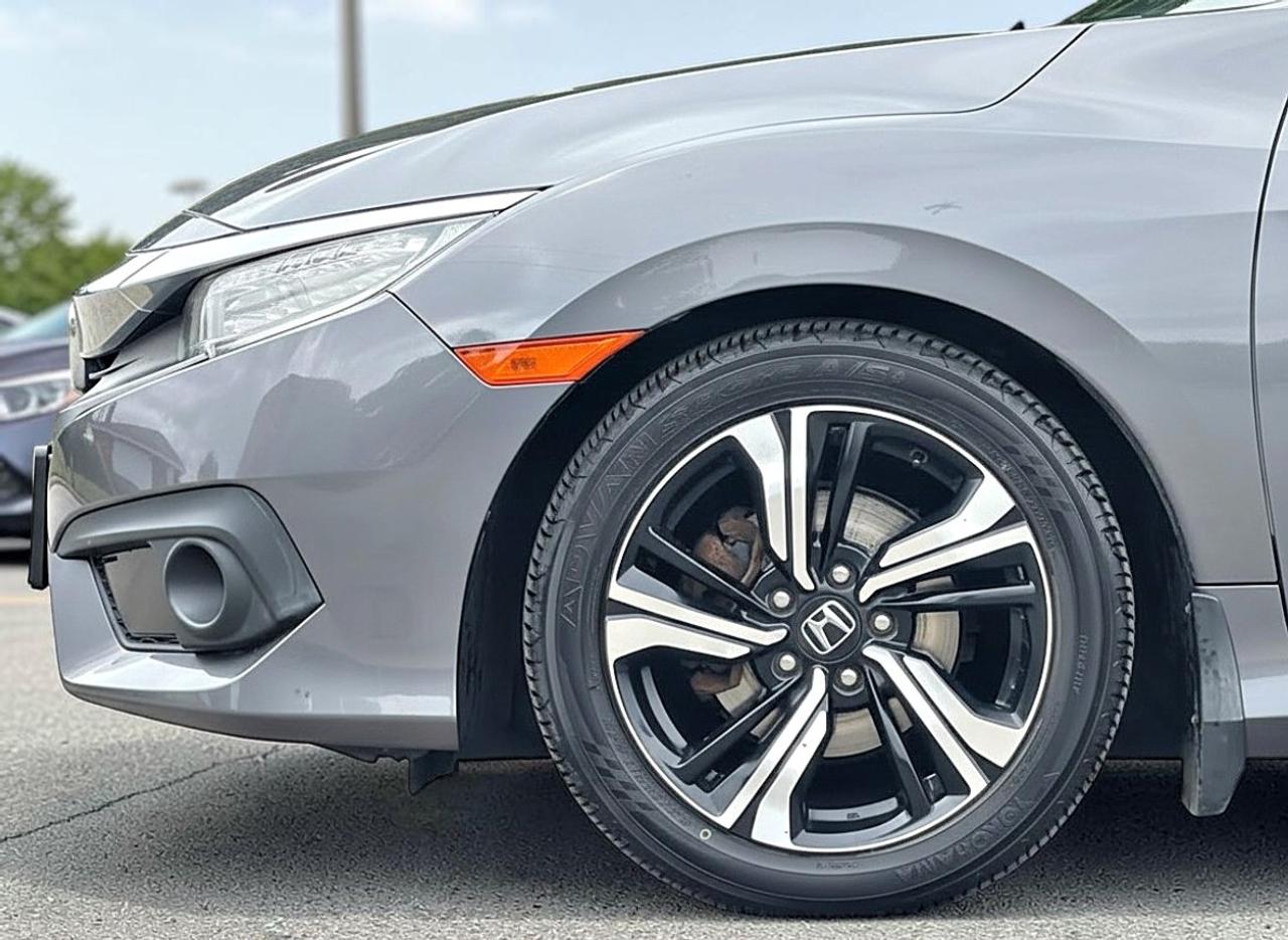 2017 Honda Civic 2dr CVT Touring Photo