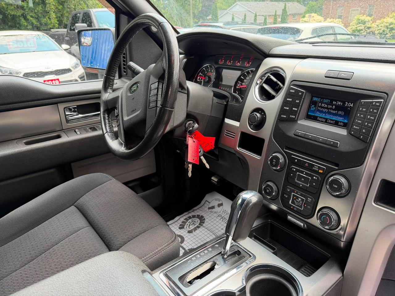 2014 Ford F-150 4WD SUPERCREW 145" FX4 Photo