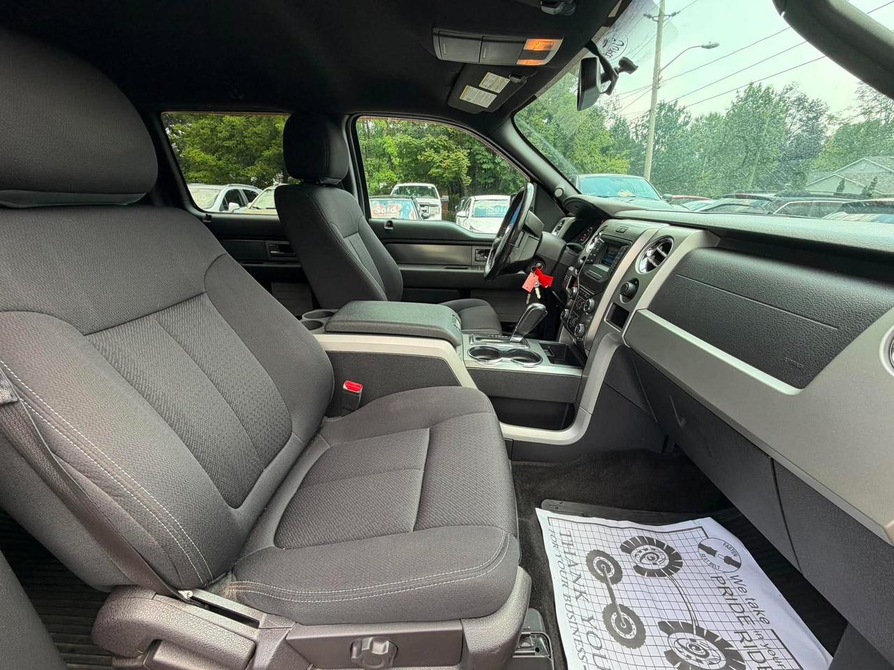 2014 Ford F-150 4WD SUPERCREW 145" FX4 Photo