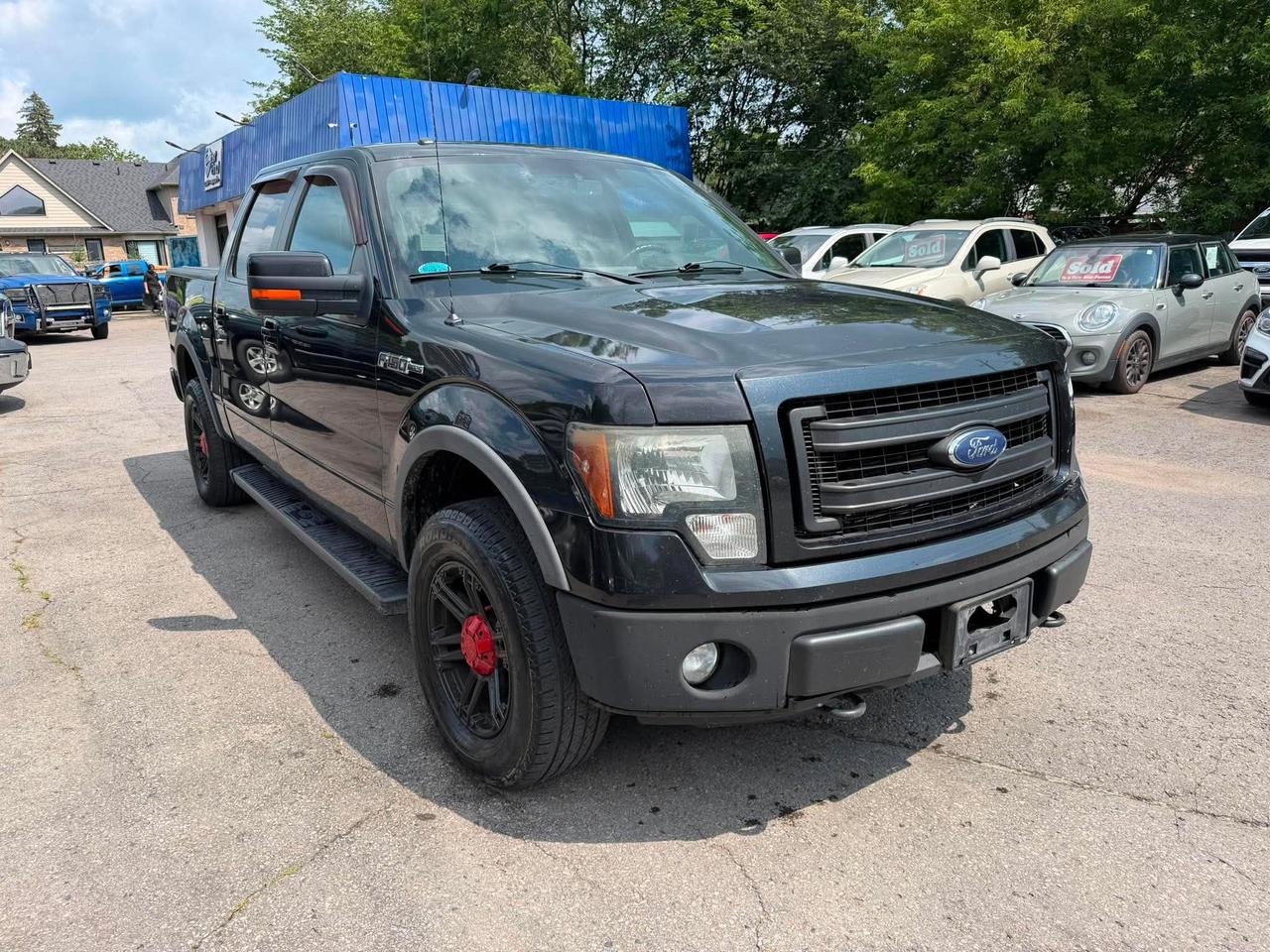 Used 2014 Ford F-150 4WD SUPERCREW 145