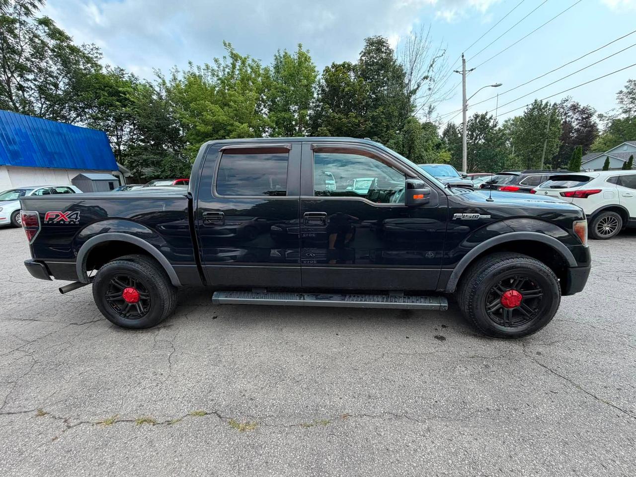 2014 Ford F-150 4WD SUPERCREW 145" FX4 Photo