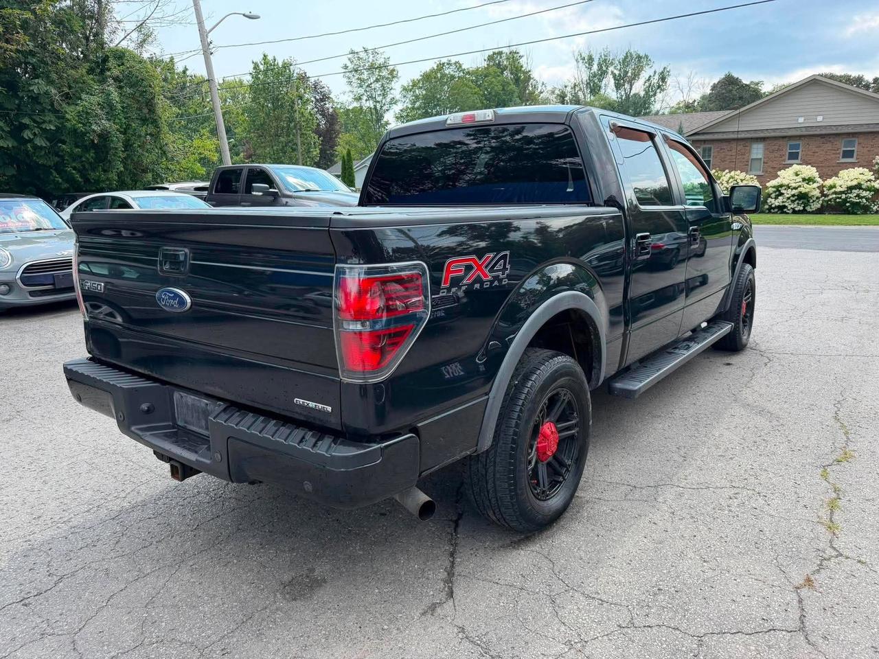 2014 Ford F-150 4WD SUPERCREW 145" FX4 Photo