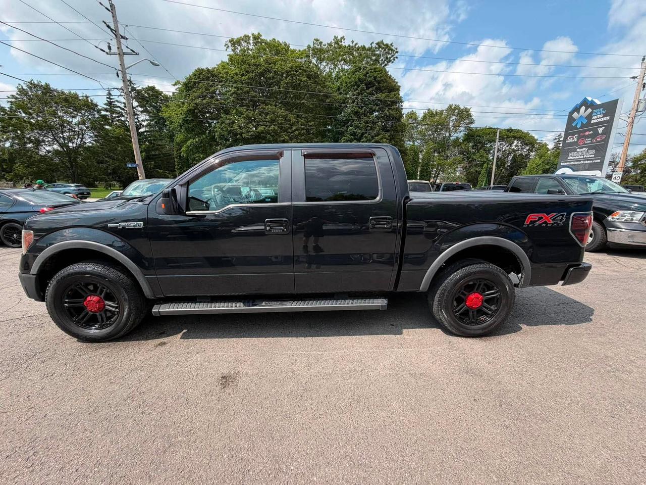 2014 Ford F-150 4WD SUPERCREW 145" FX4 Photo