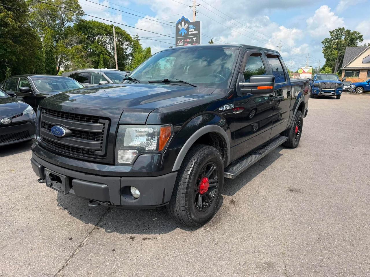 2014 Ford F-150 4WD SUPERCREW 145" FX4 Photo