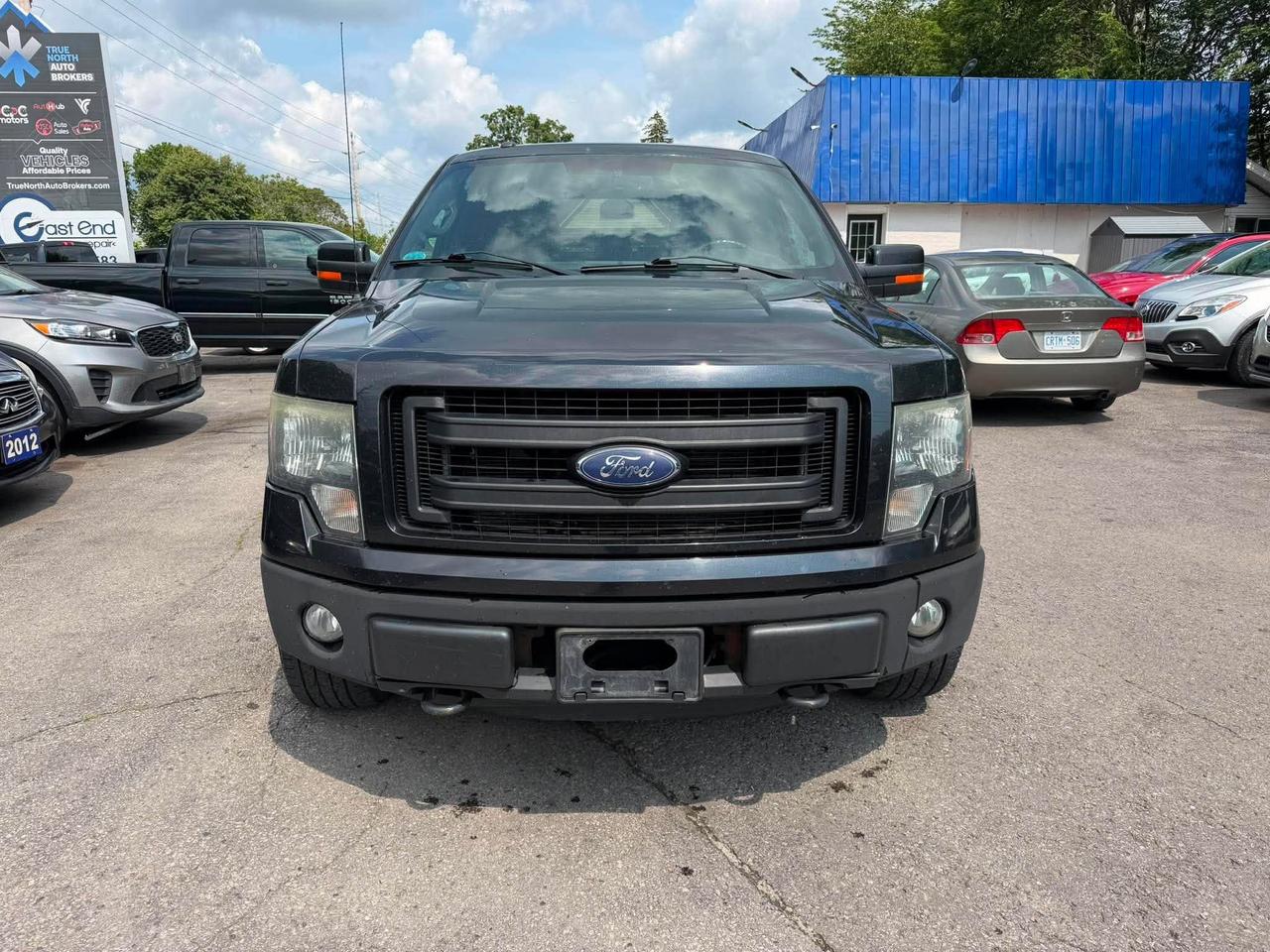 2014 Ford F-150 4WD SUPERCREW 145" FX4 Photo